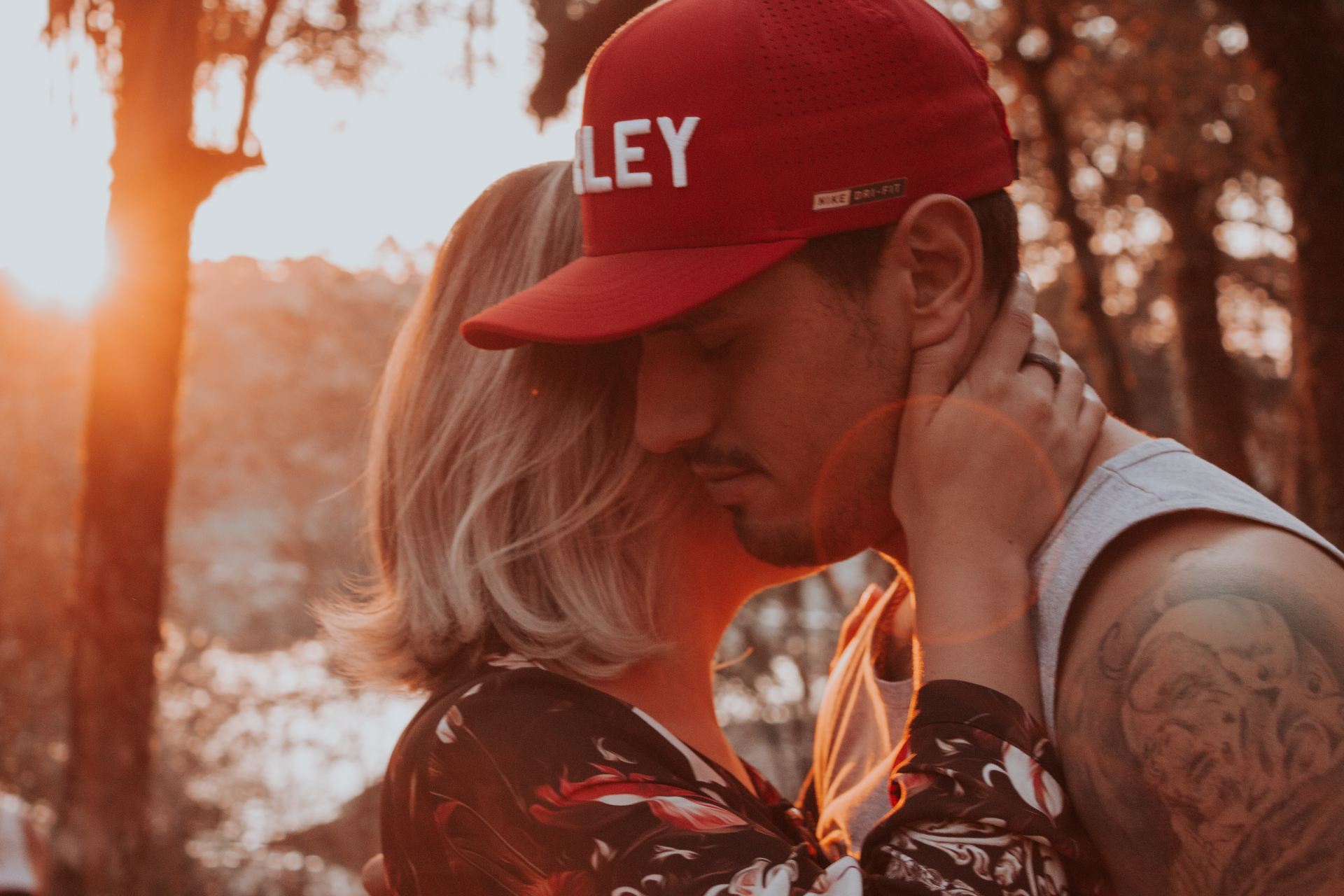 closeup photo of man and woman hugging each other