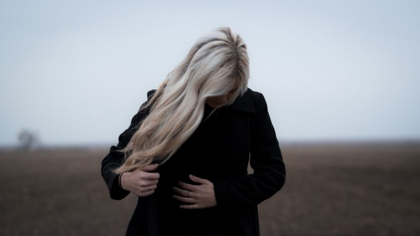 woman wearing black coat