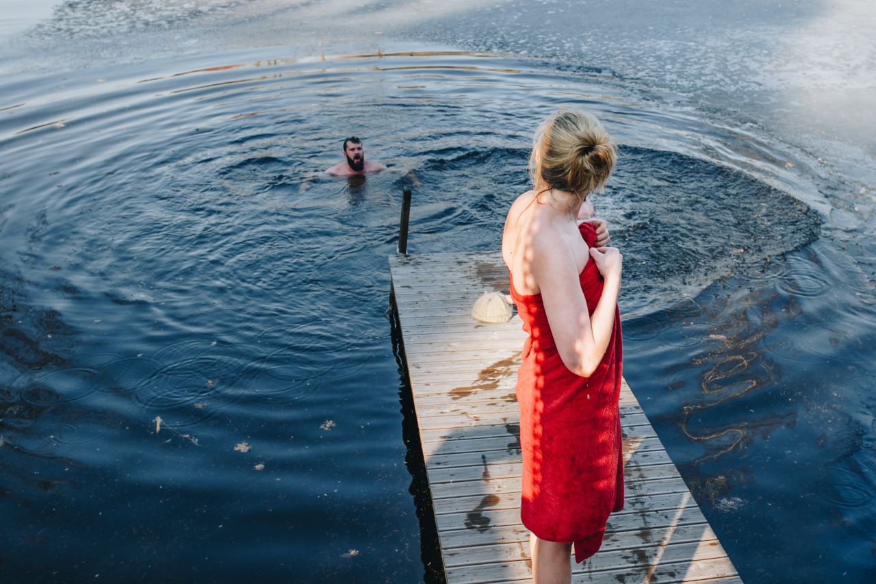 woman standing on gray dock