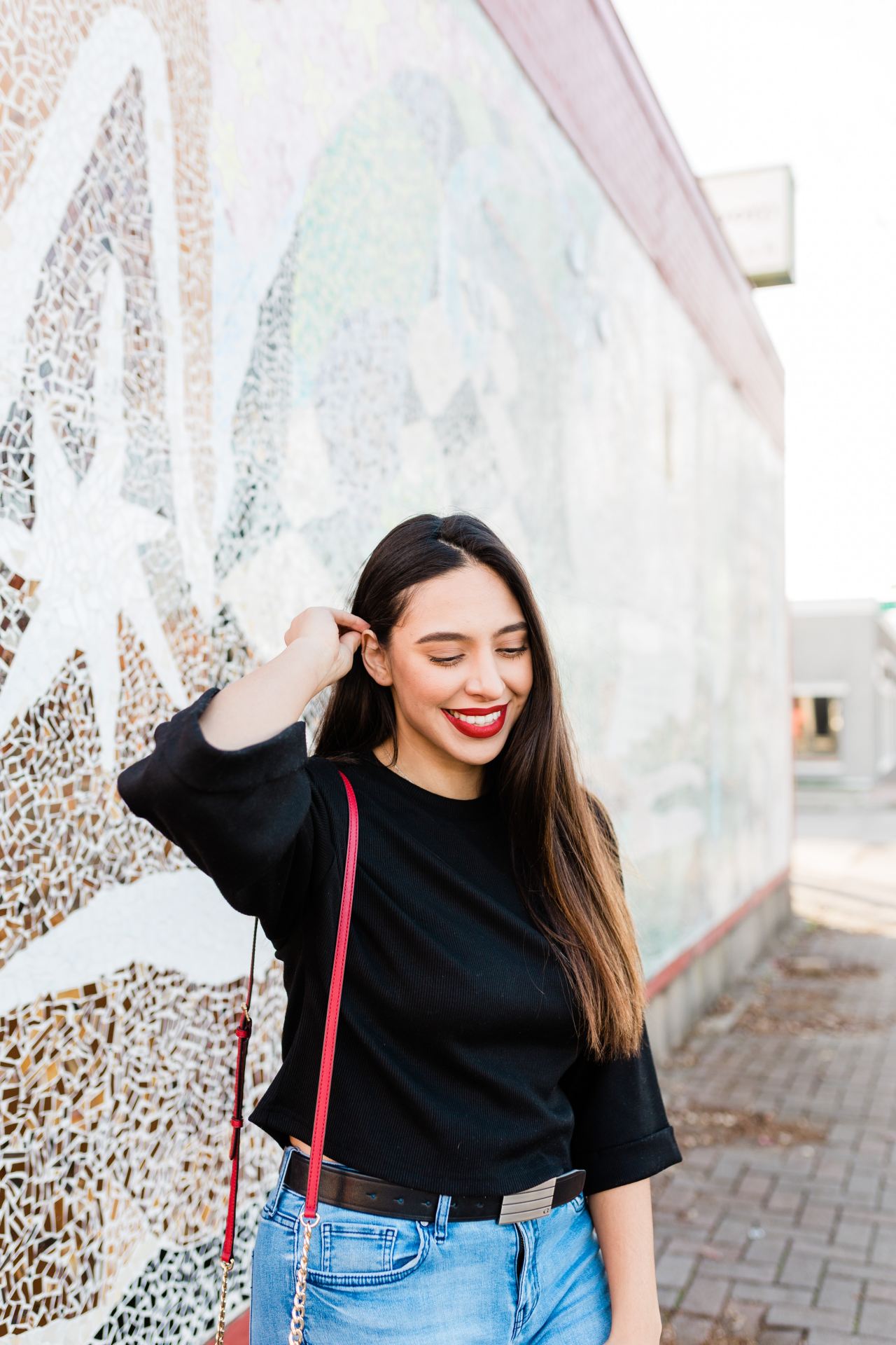 woman in black long sleeve shirt smiling