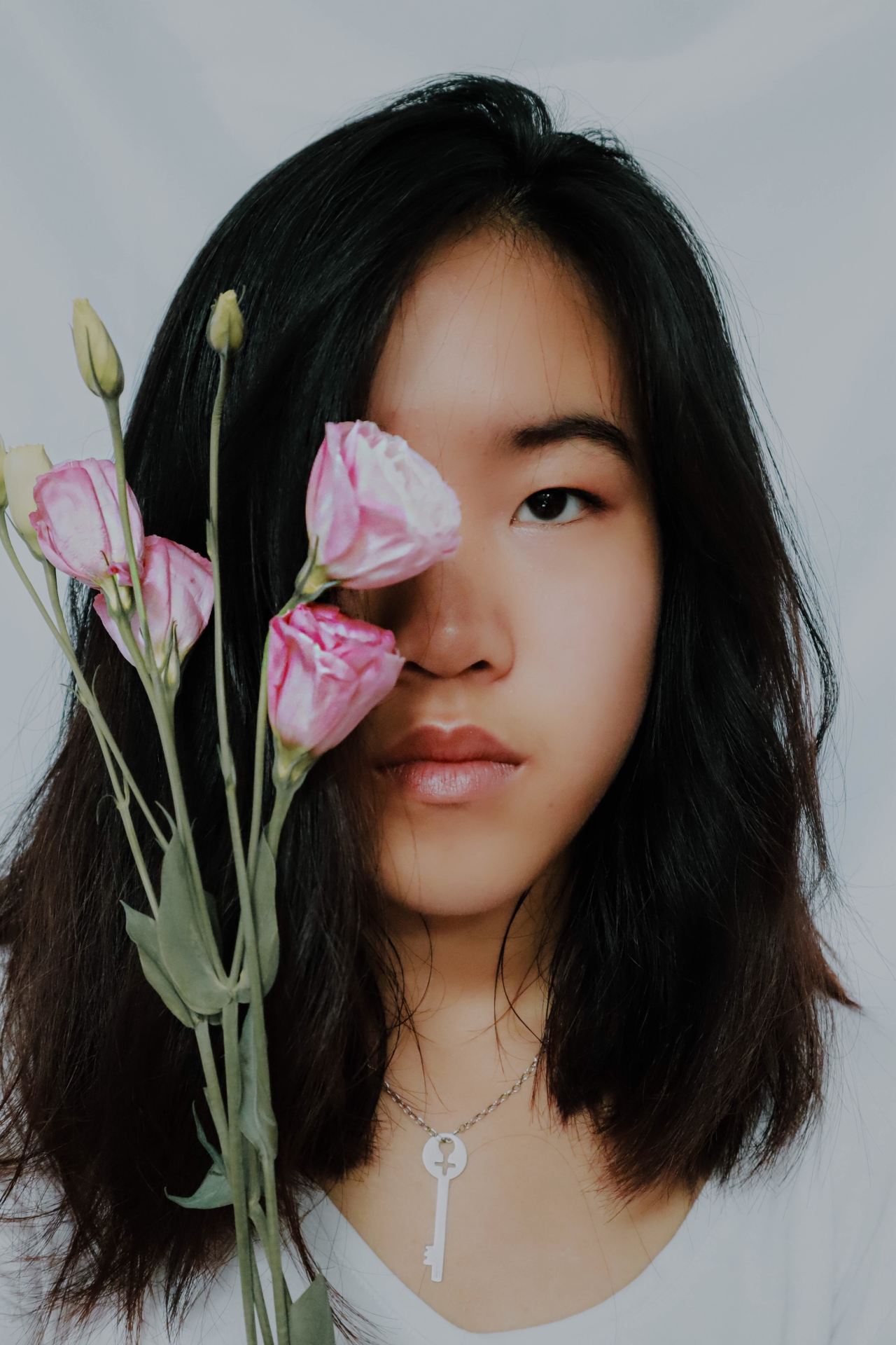 woman with pink flowers