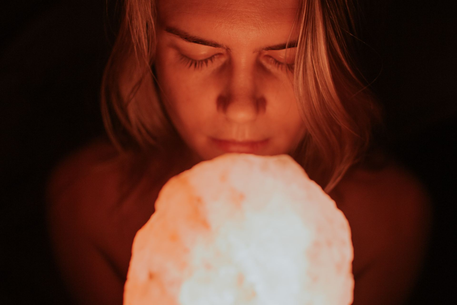 person holding Himalayan lamp