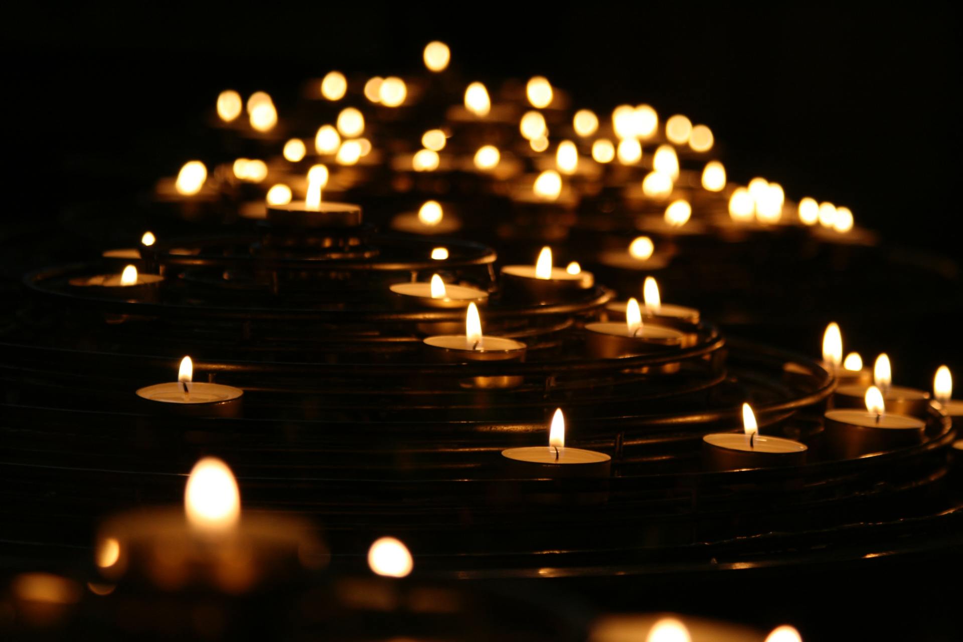 low-angled photo of lightened candles