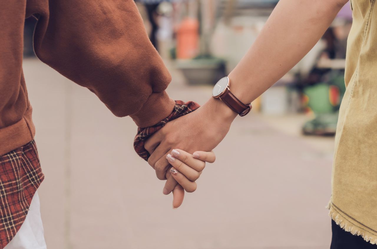 couple holding hands