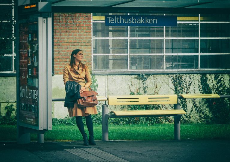 woman sitting on bench