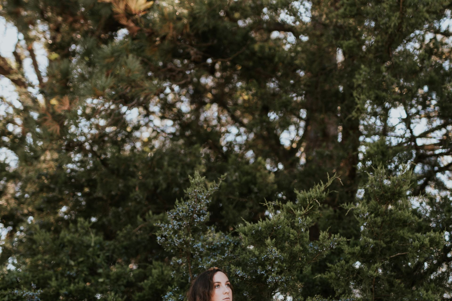 woman standing near tree