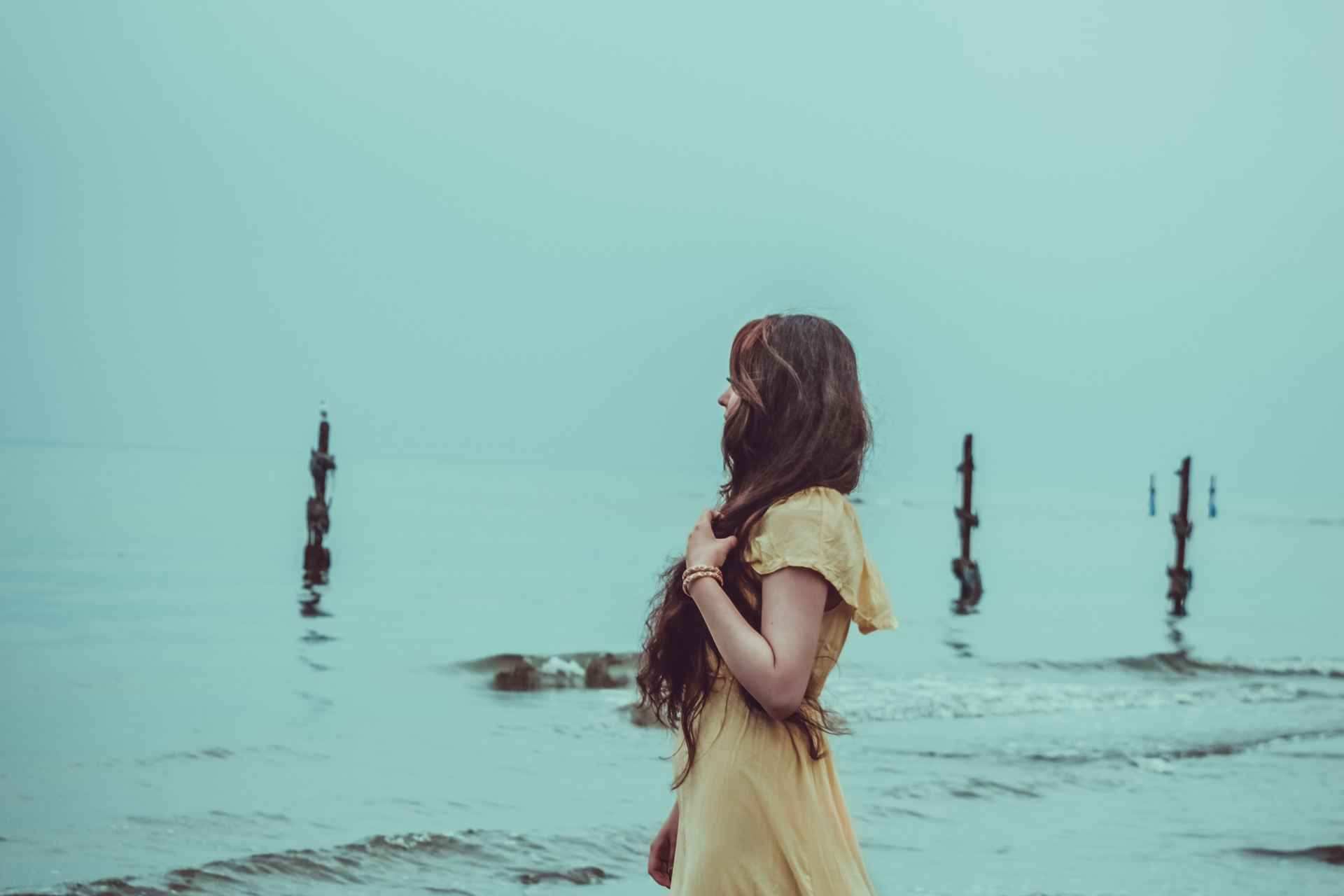 woman standing on shore