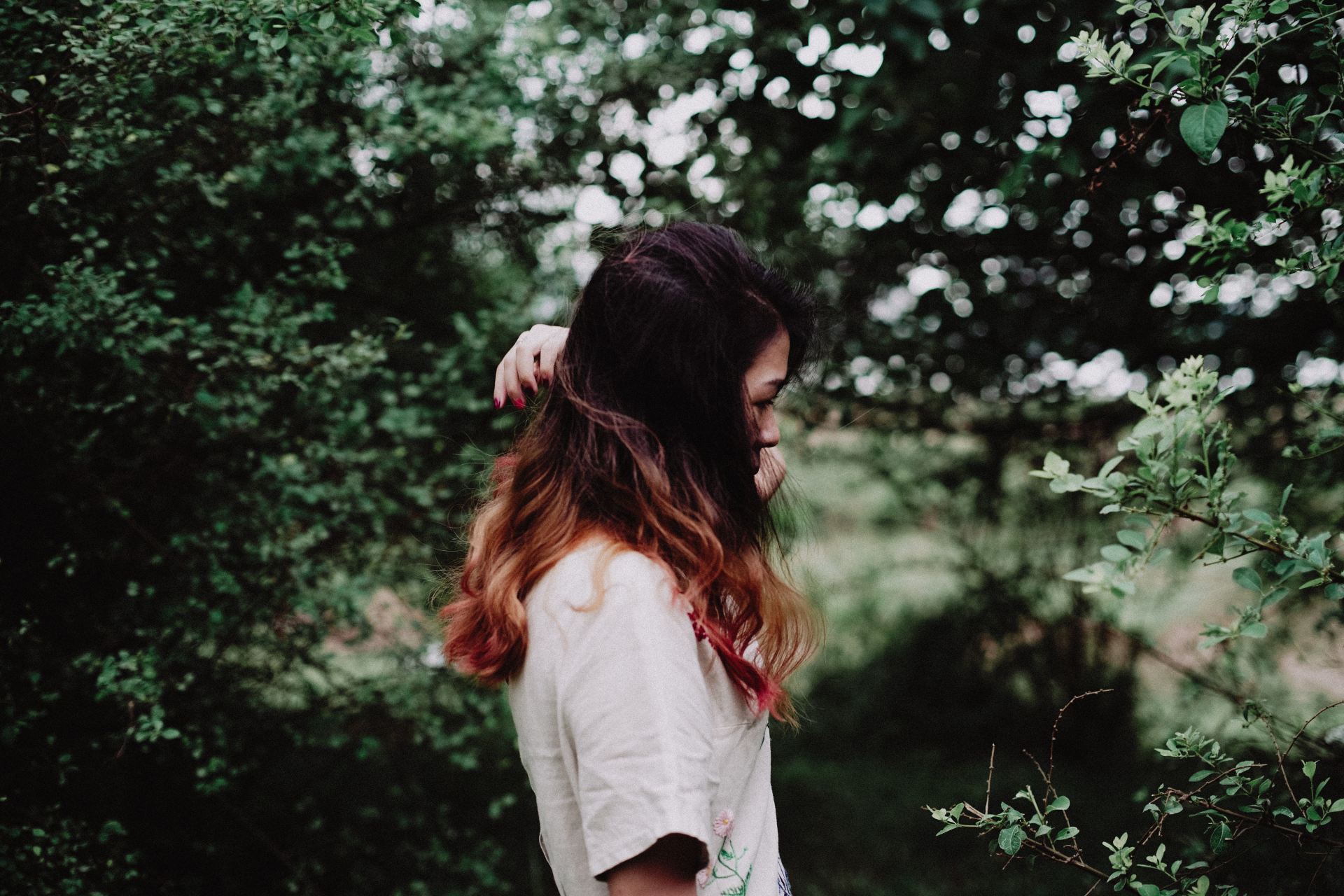 woman staring at the plants