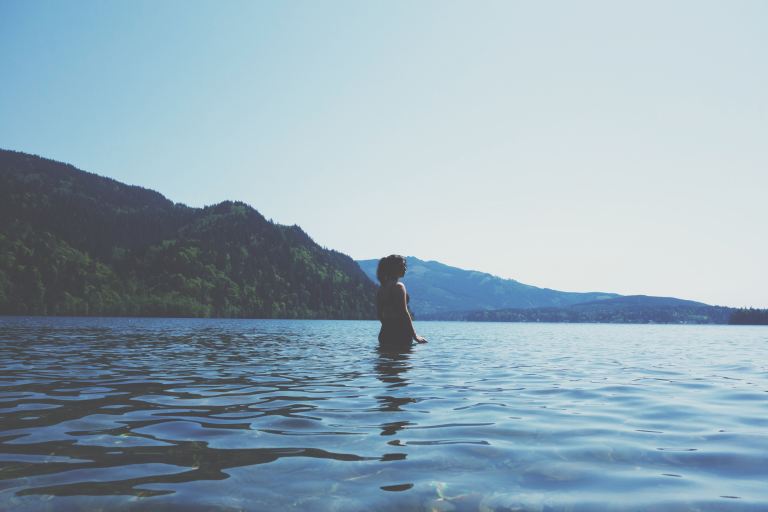 woman half-submerged in water