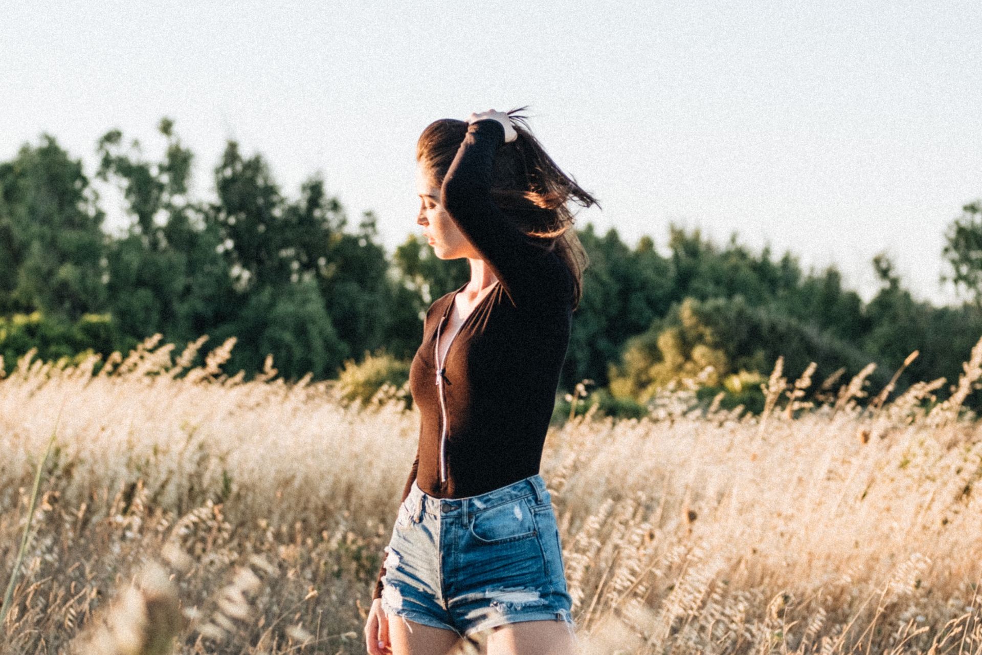 woman wearing blue short shorts