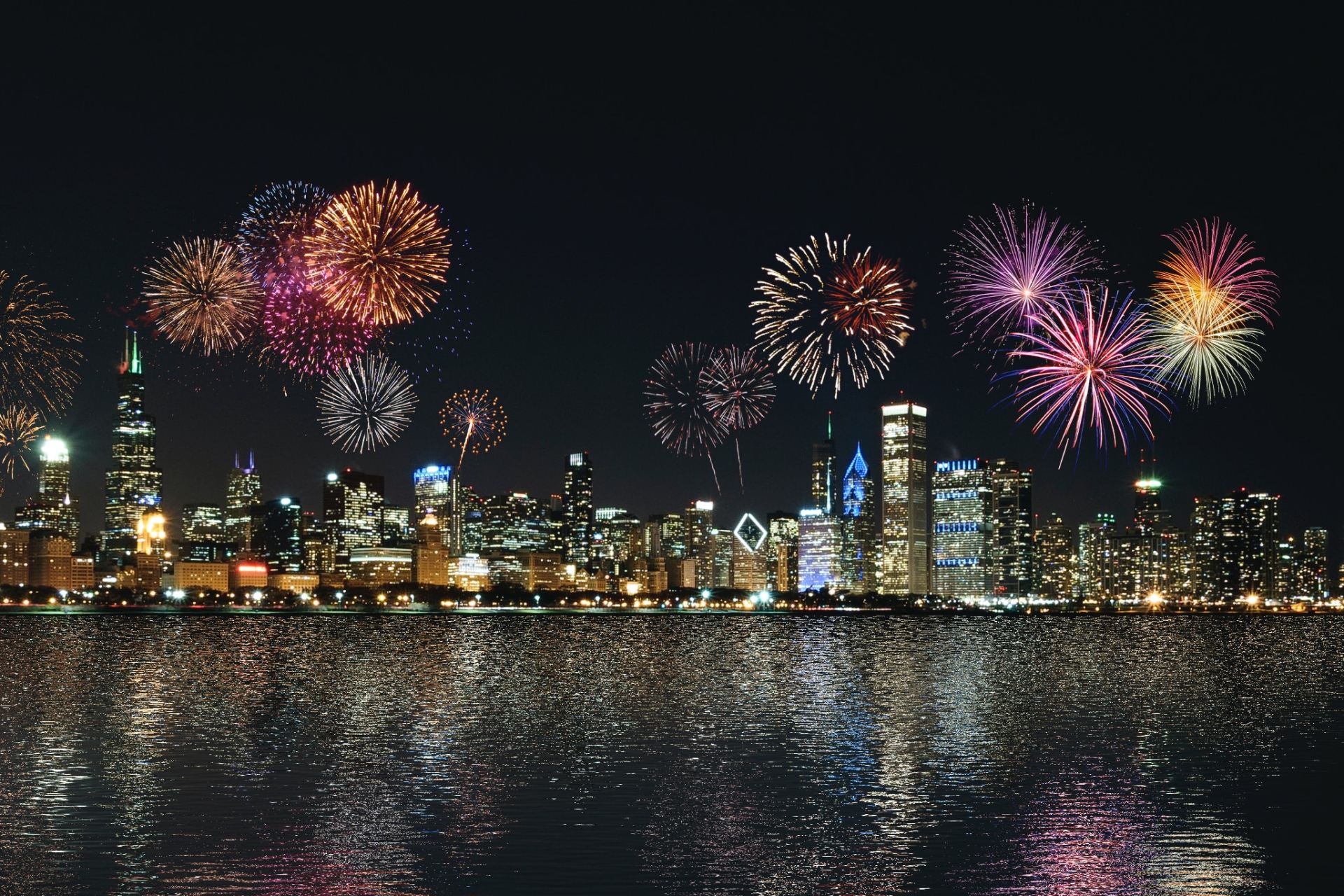 skyline buildings under fireworks display