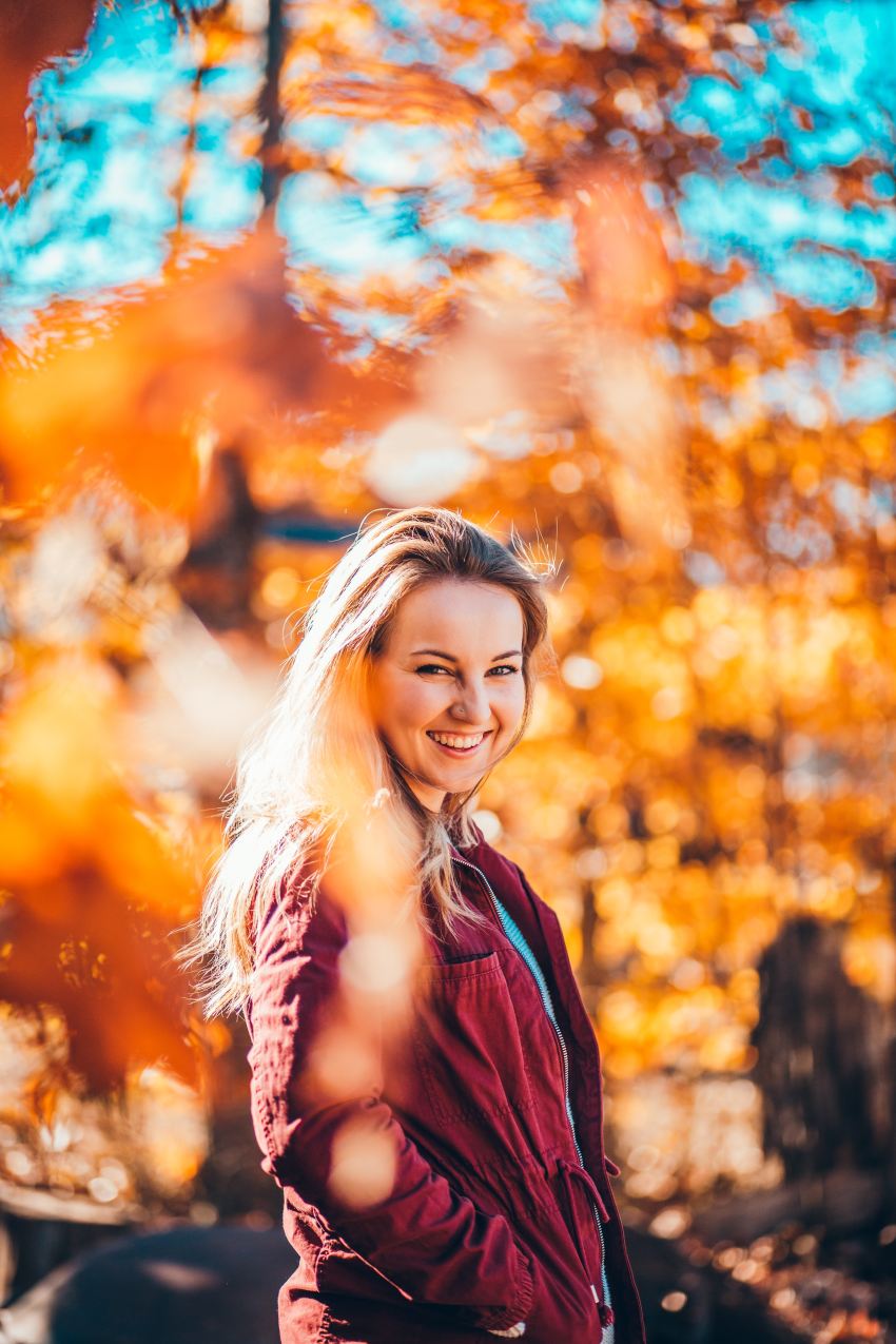 woman standing near trees