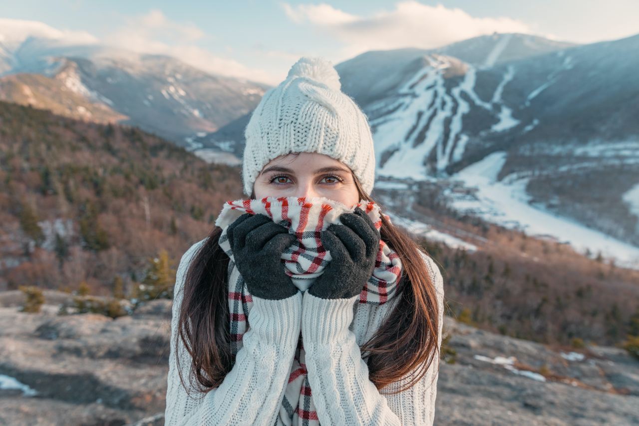 woman standing on mountain during daytime