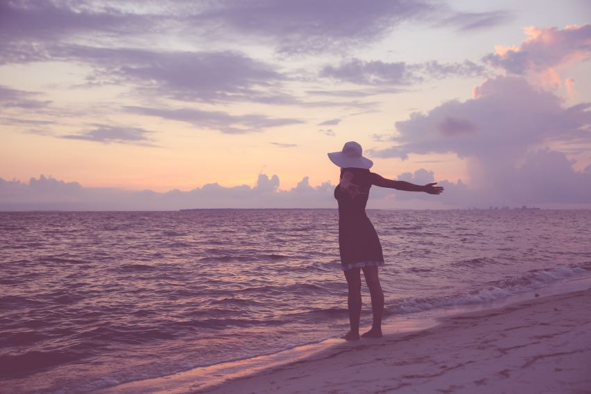 woman standing on beach