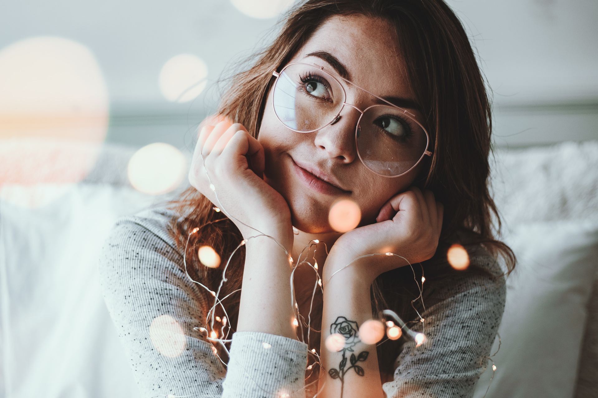 smiling woman looking upward