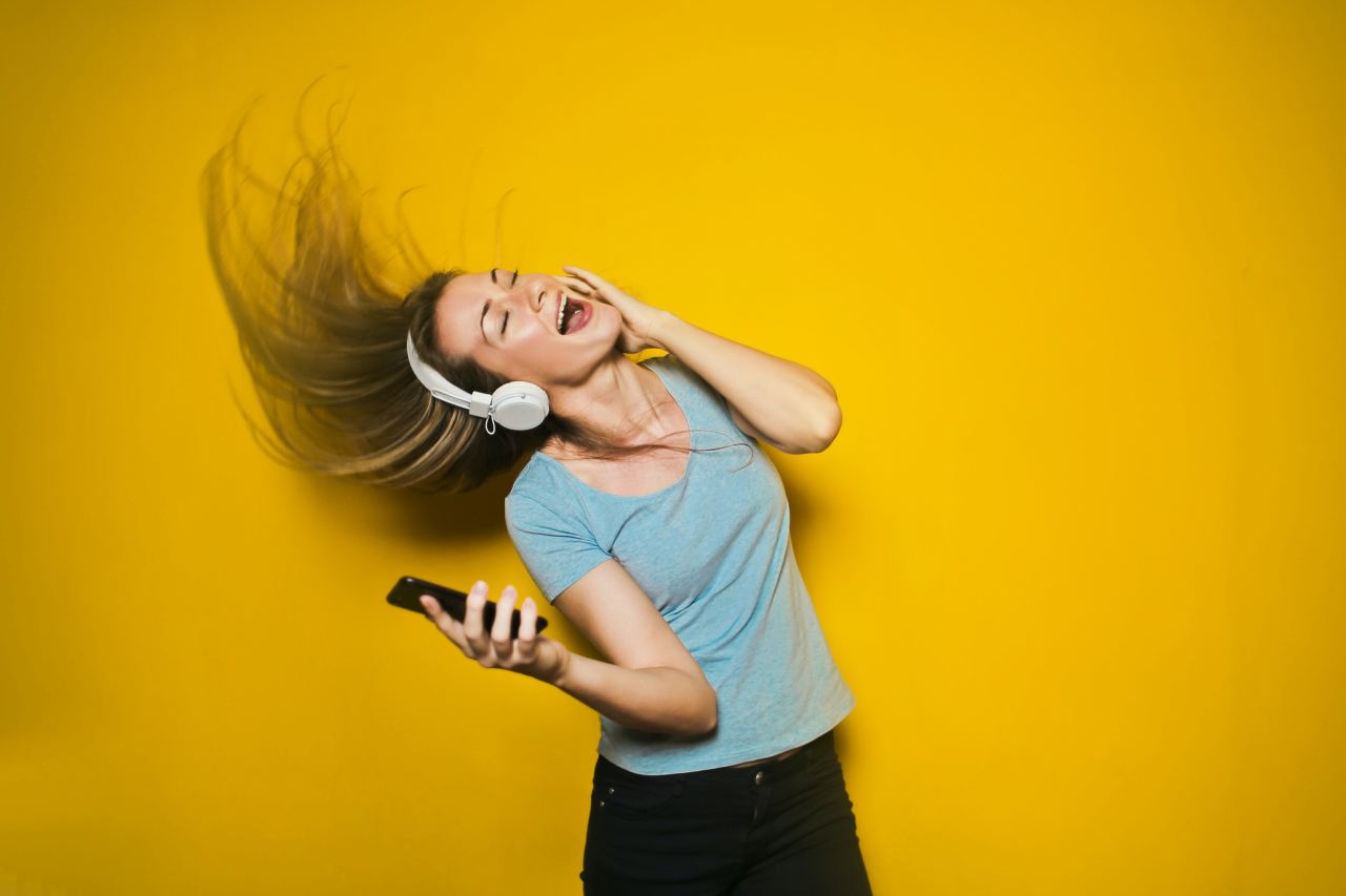 woman wearing white headphones