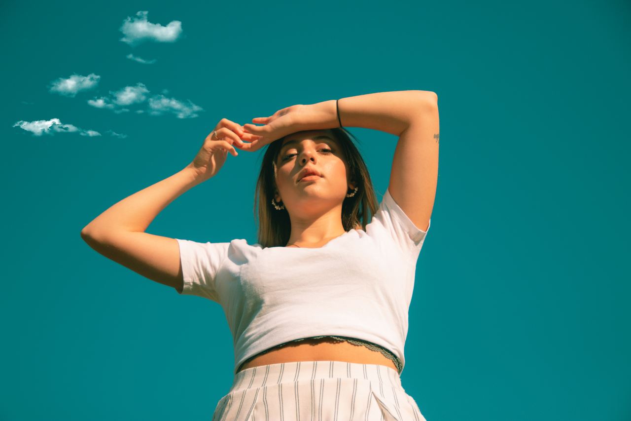 woman in white shirt and white skirt