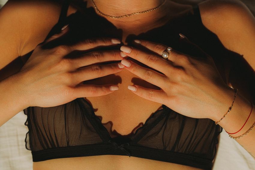 woman in black tank top wearing silver ring