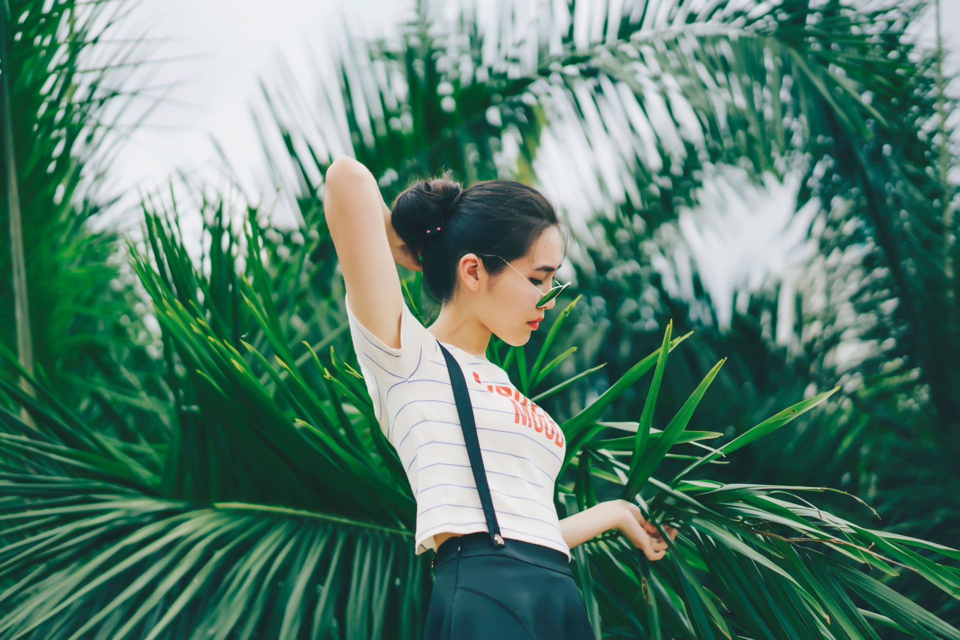 woman fixing her hair