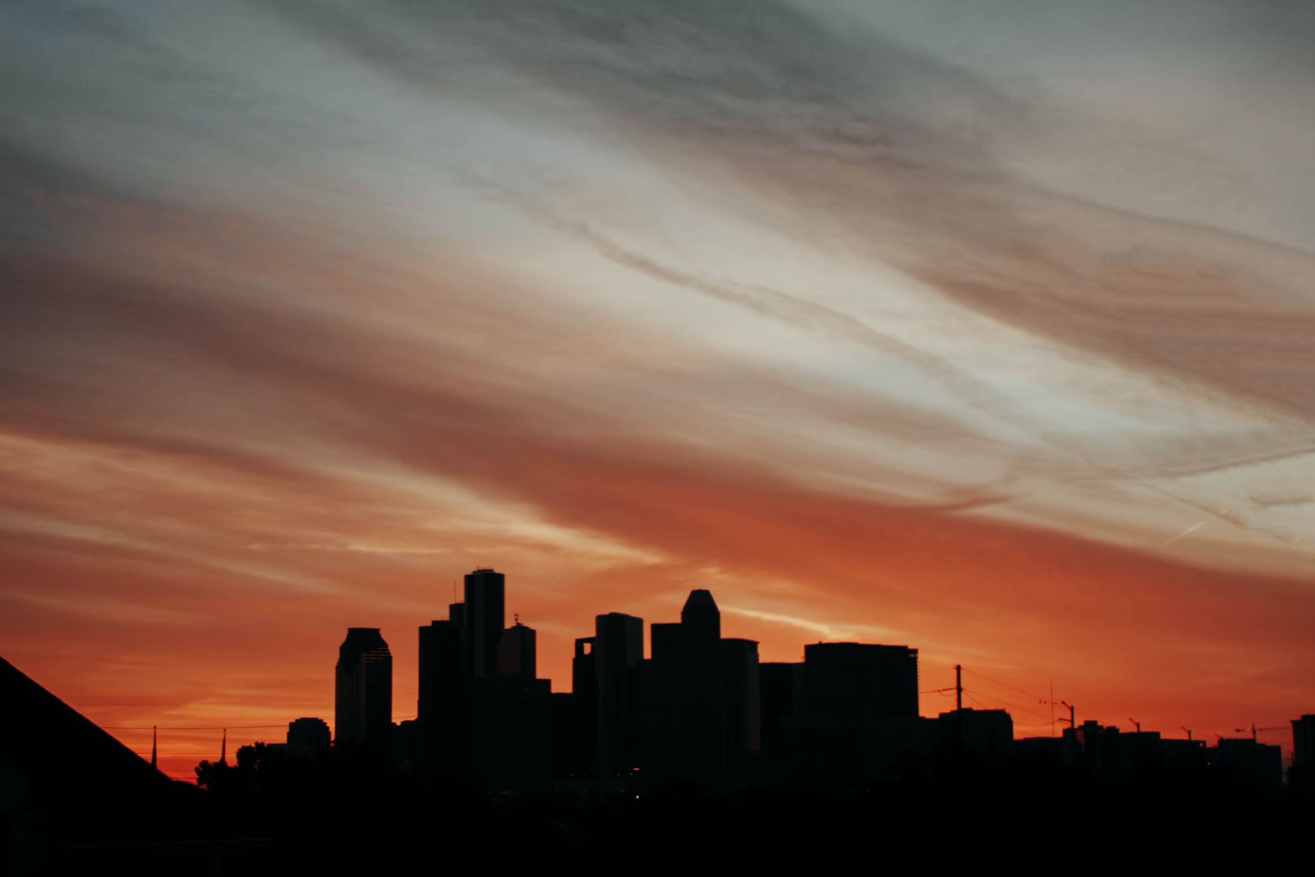 silhouette of building during sunset