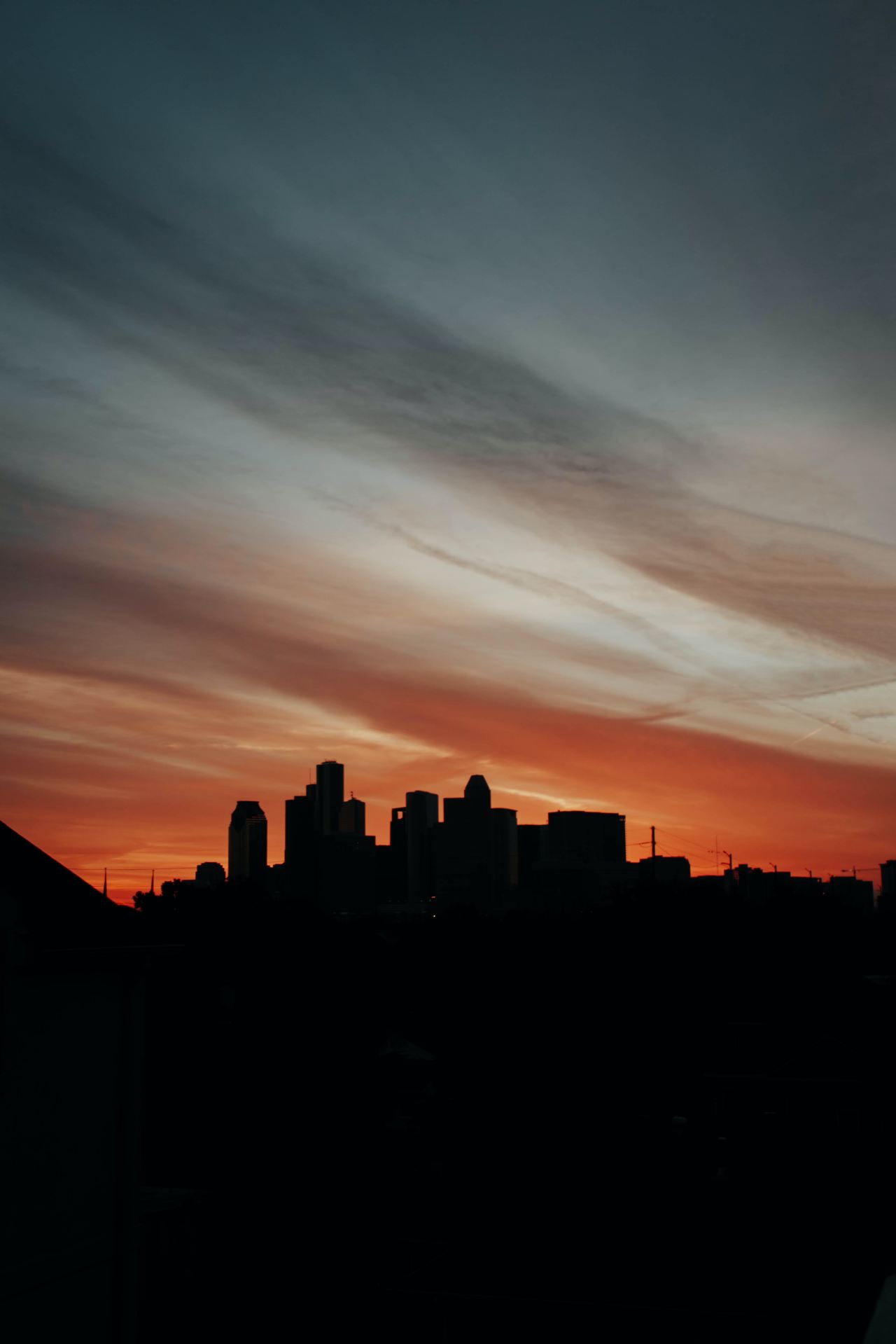 silhouette of building during sunset