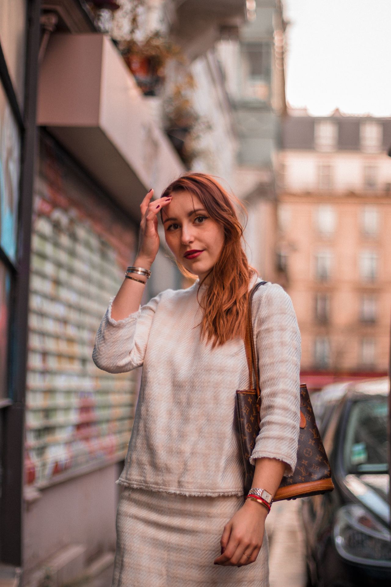 woman in white long sleeve shirt smiling