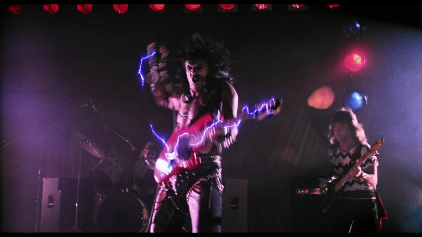 Sammi Curr wails on his guitar in Trick or Treat (1986).
