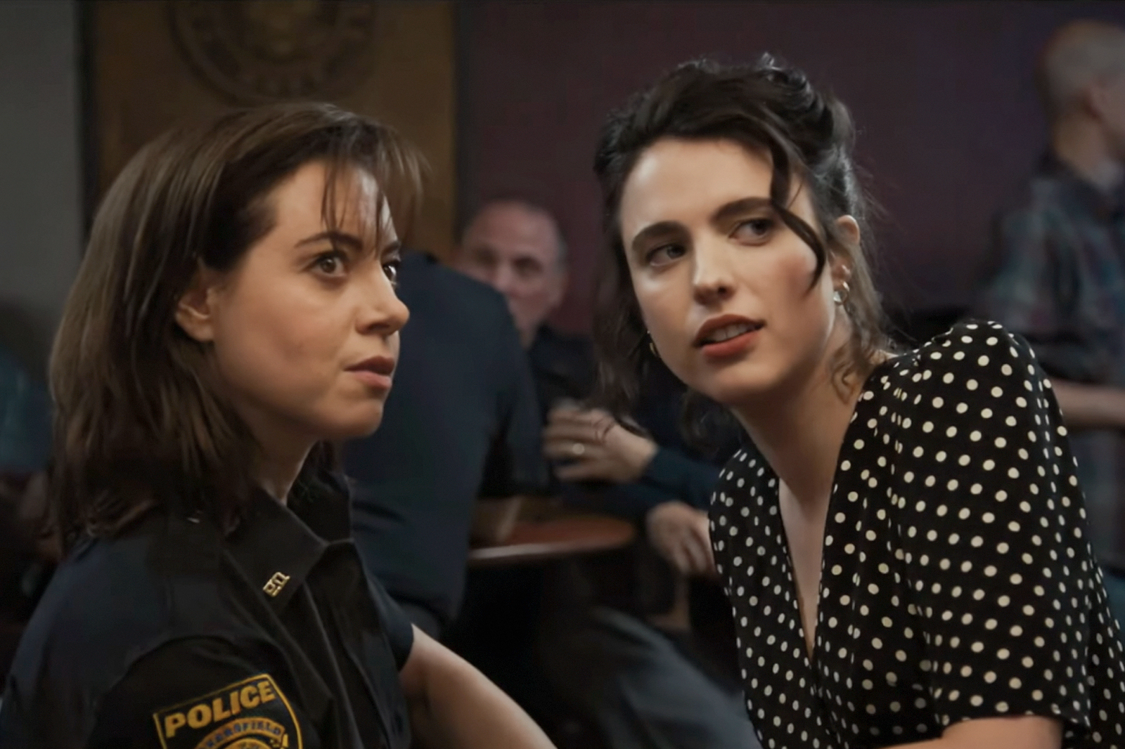 The ‘Honey Don’t’ Trailer Just Gave Us Aubrey Plaza In A Cop Uniform And Margaret Qualley In A Pencil Skirt—Is It Gay Christmas In May?