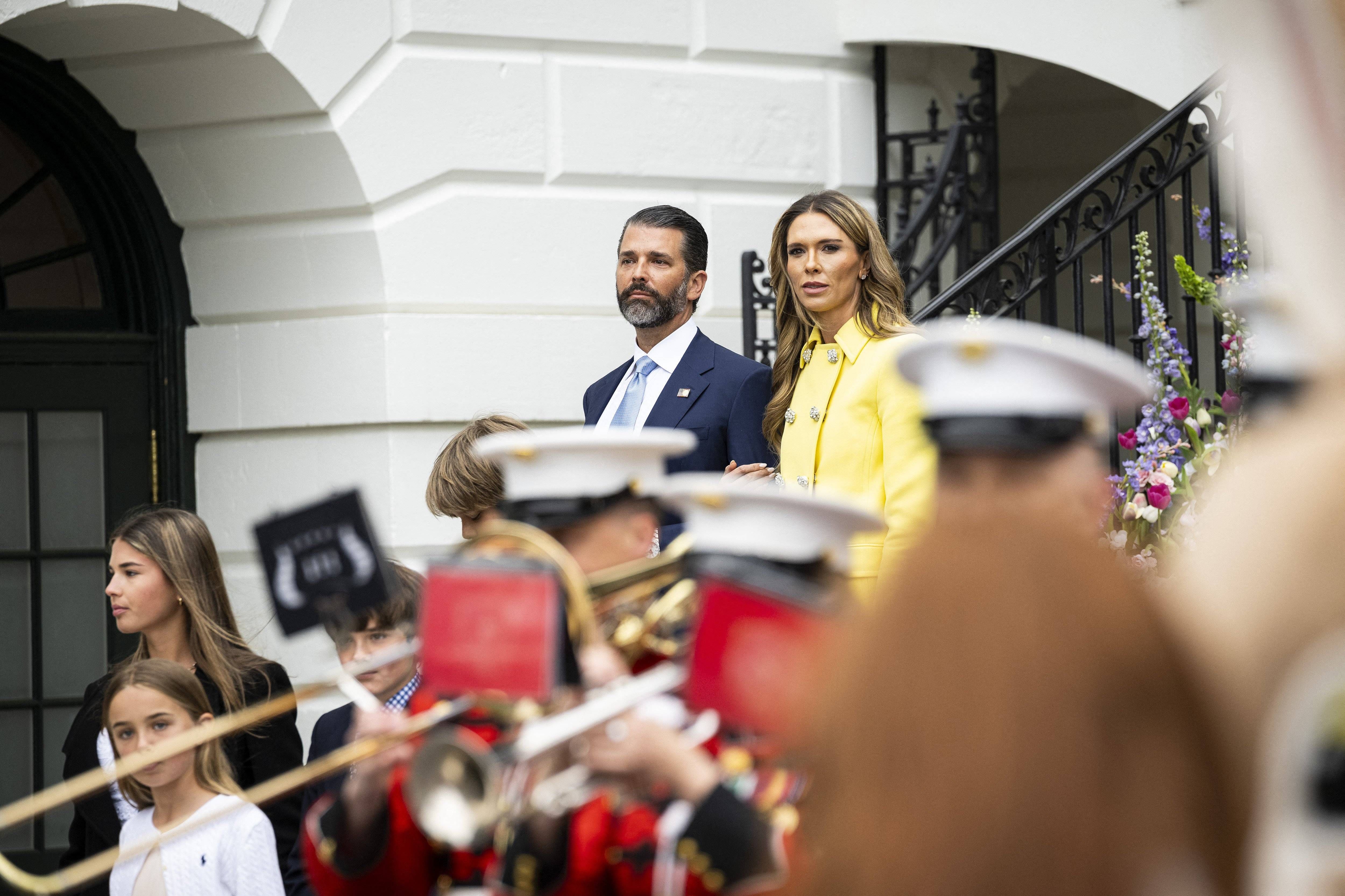 Donald Trump Jr. and Bettina Anderson arriving at the White House Easter Egg Roll on the South Lawn
