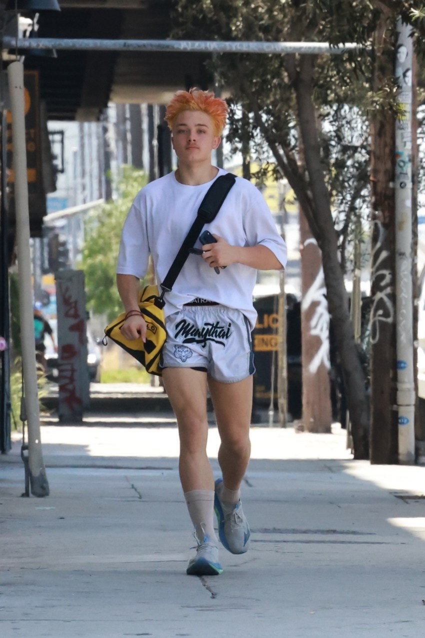 Knox Jolie-Pitt running to his car after Muay Thai class in Los Angeles