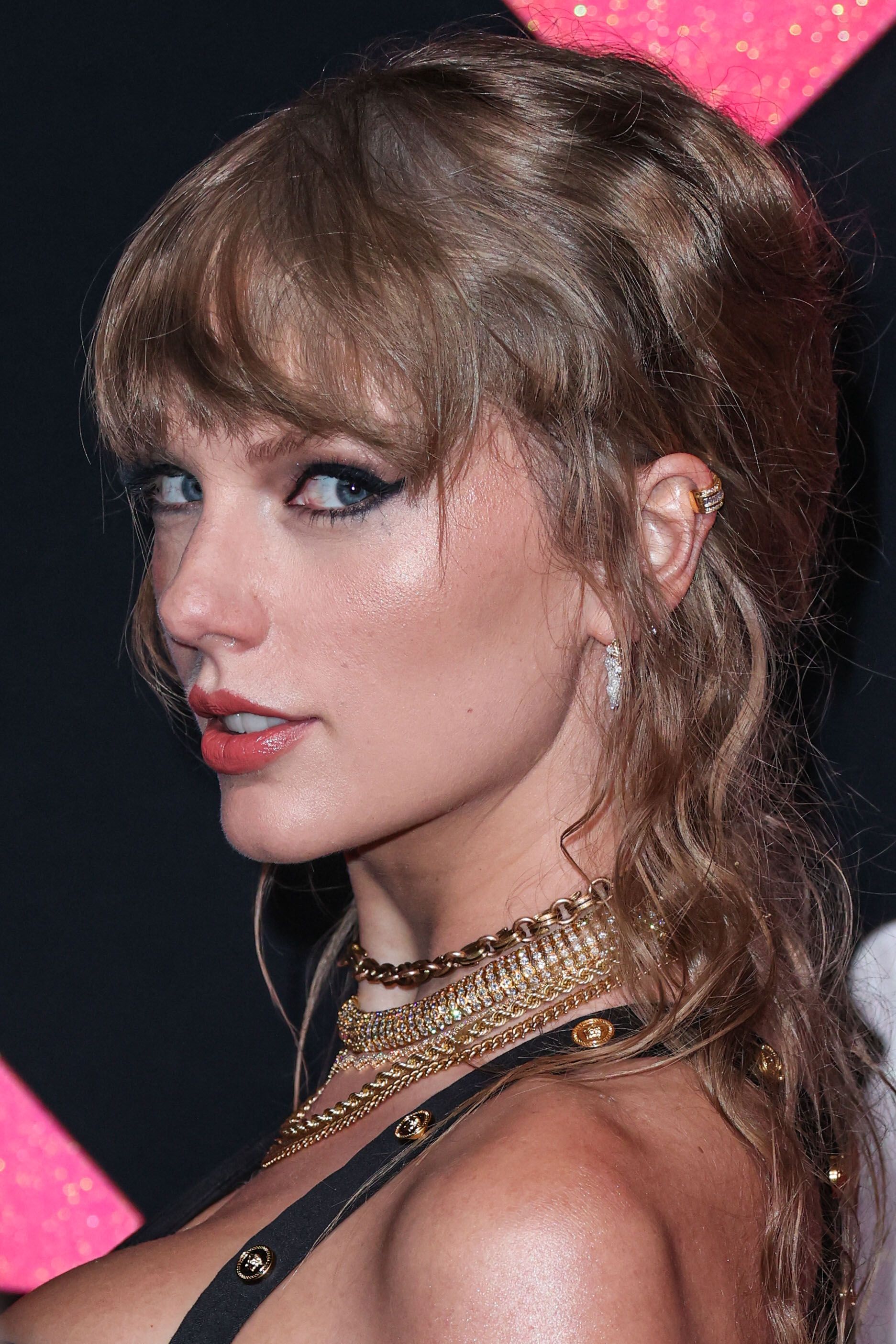 Click to open the image gallery Taylor Swift wearing a Versace dress at the 2023 MTV Video Music Awards at the Prudential Center in Newark, New Jersey