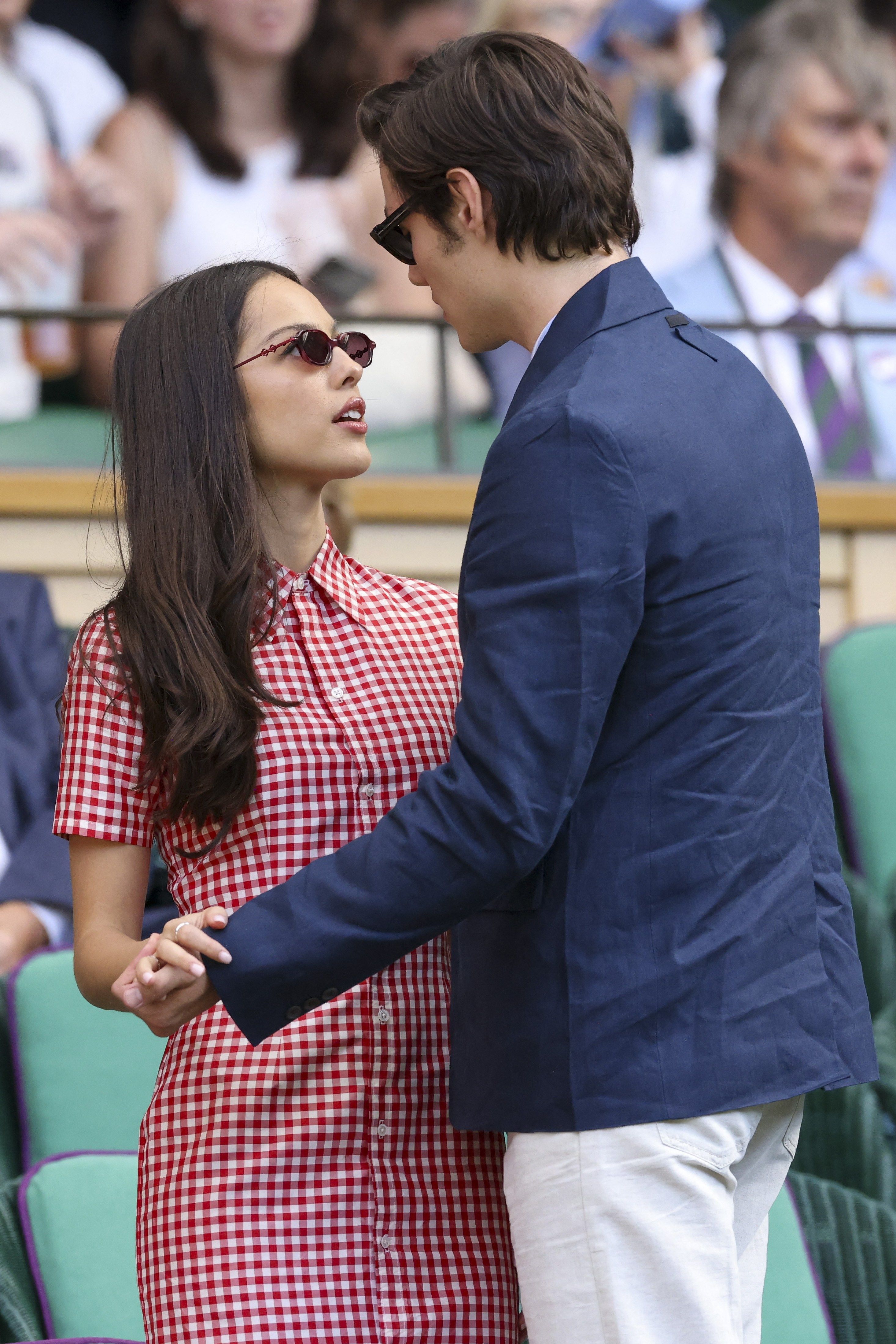 Louis Partridge and Olivia Rodrigo seated in the Royal Box at the 2025 Wimbledon Championships