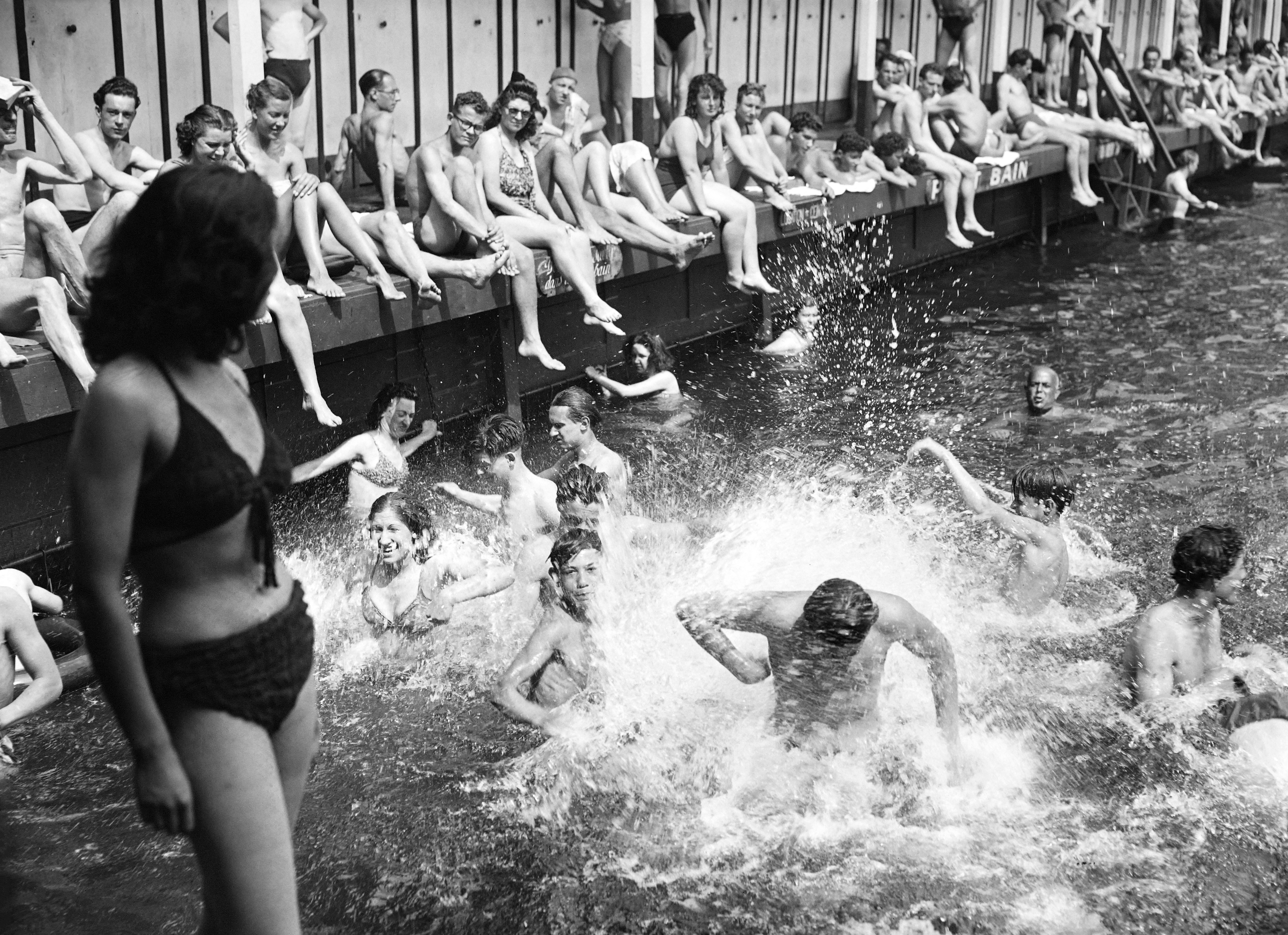 Swimmers at the Deligny pool on the banks of the Seine river in Paris, 1946