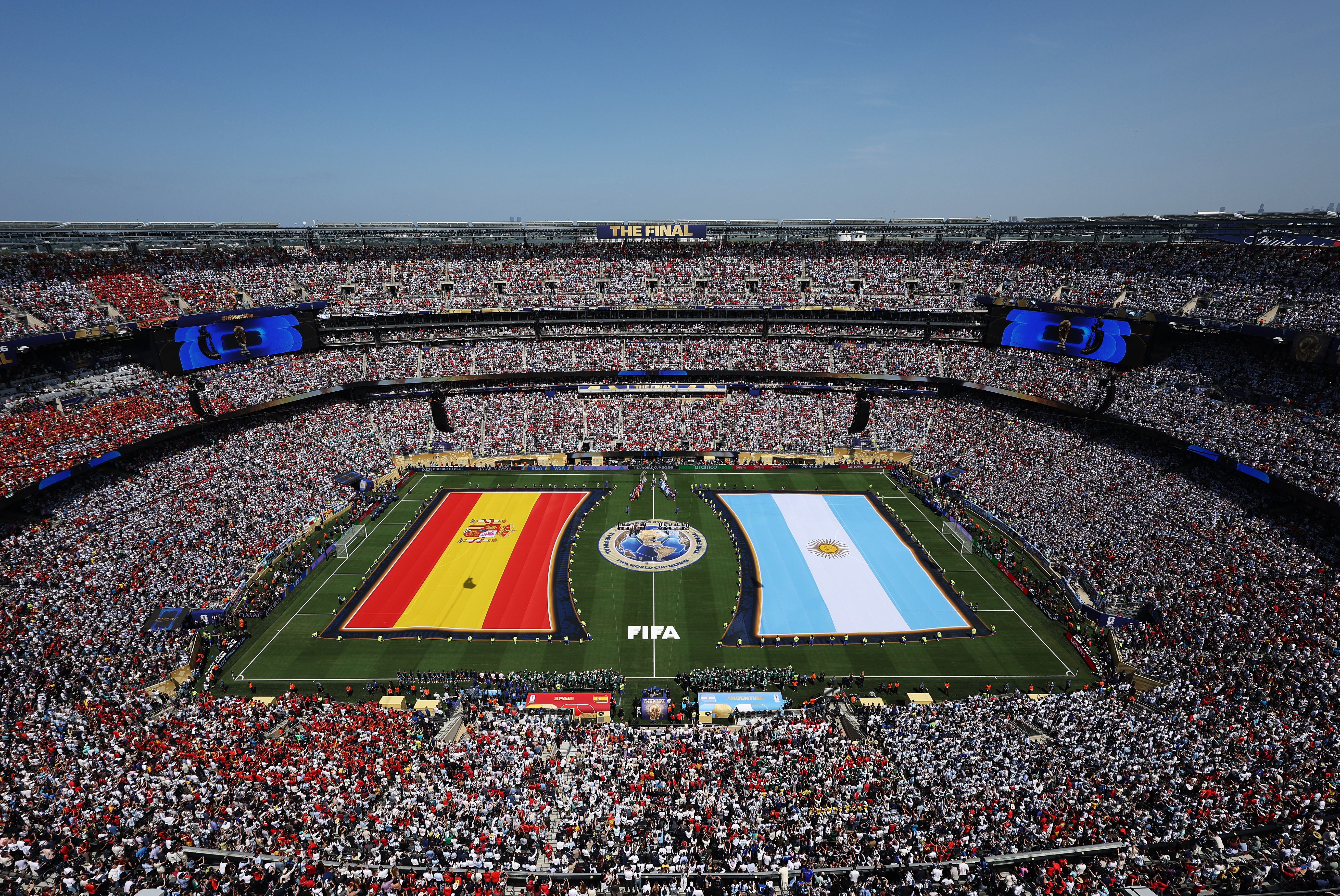 Players and match officials lined up on the pitch before the FIFA World Cup 2026 Final between Spain and Argentina at New York New Jersey Stadium.