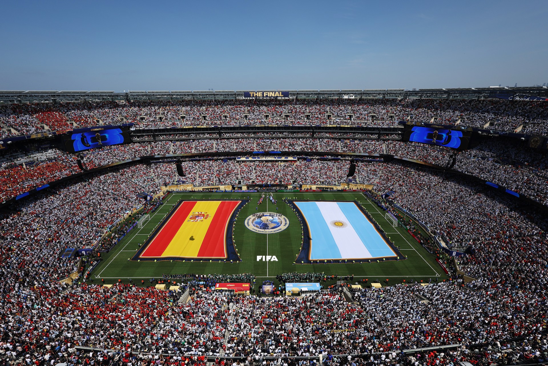 Players and match officials lined up on the pitch before the FIFA World Cup 2026 Final between Spain and Argentina at New York New Jersey Stadium.