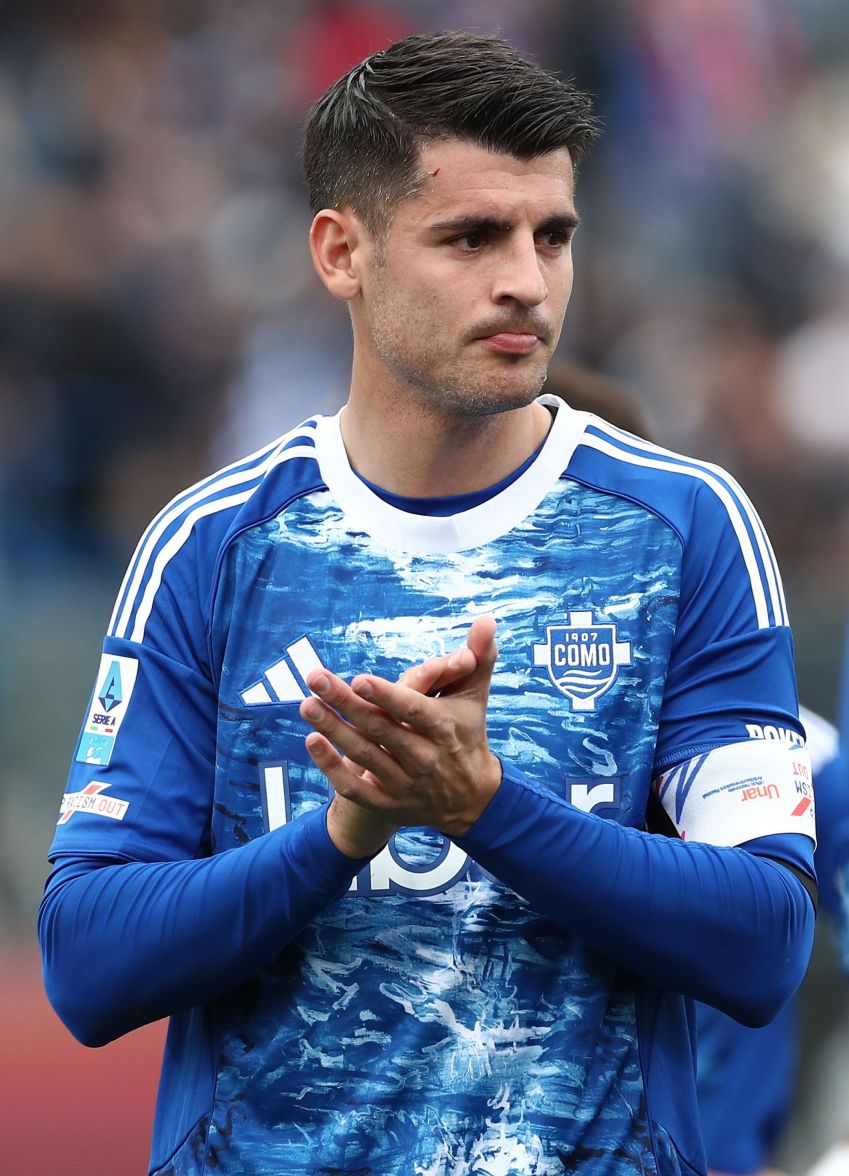 Alvaro Morata saluting fans in the stands at Giuseppe Sinigaglia Stadium after a Serie A match