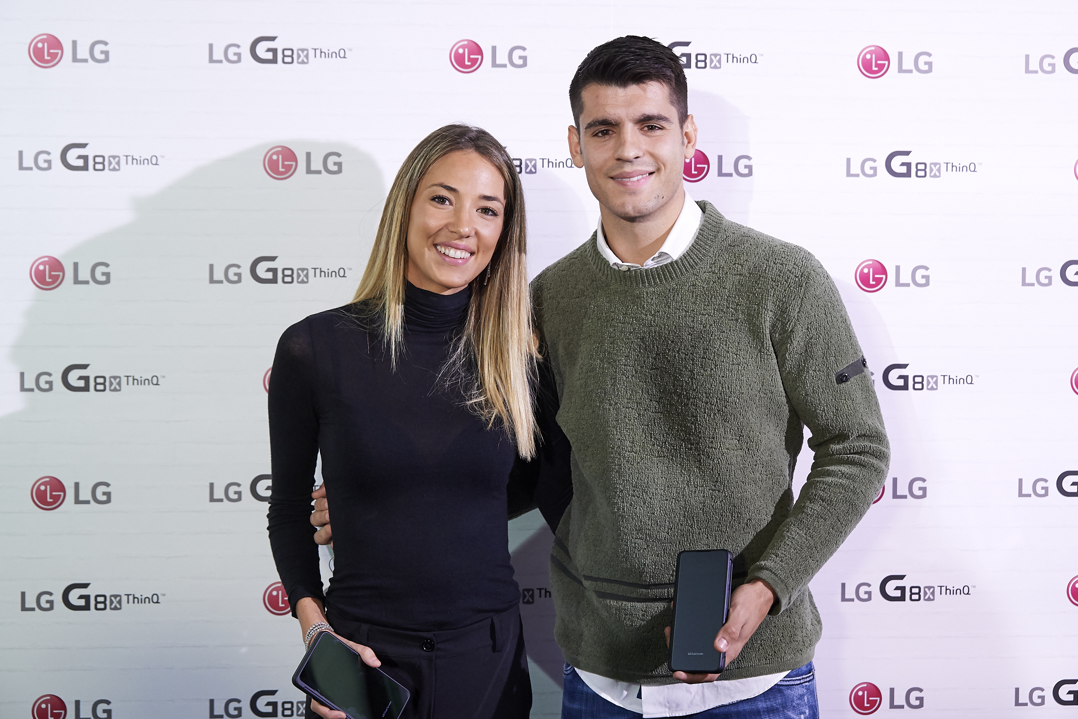 Click to open the image gallery Alvaro Morata and Alice Campello smiling together at an LG smartphone launch event in Madrid