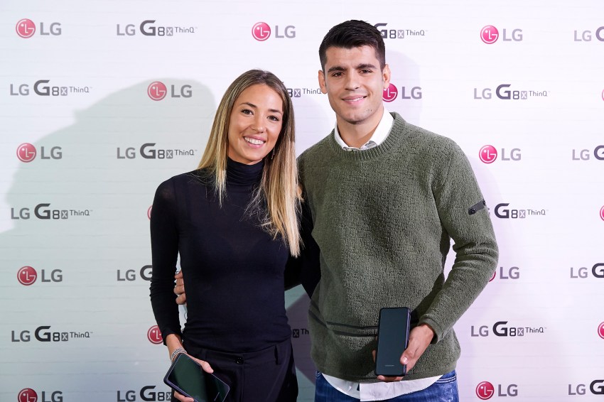 Alvaro Morata and Alice Campello smiling together at an LG smartphone launch event in Madrid