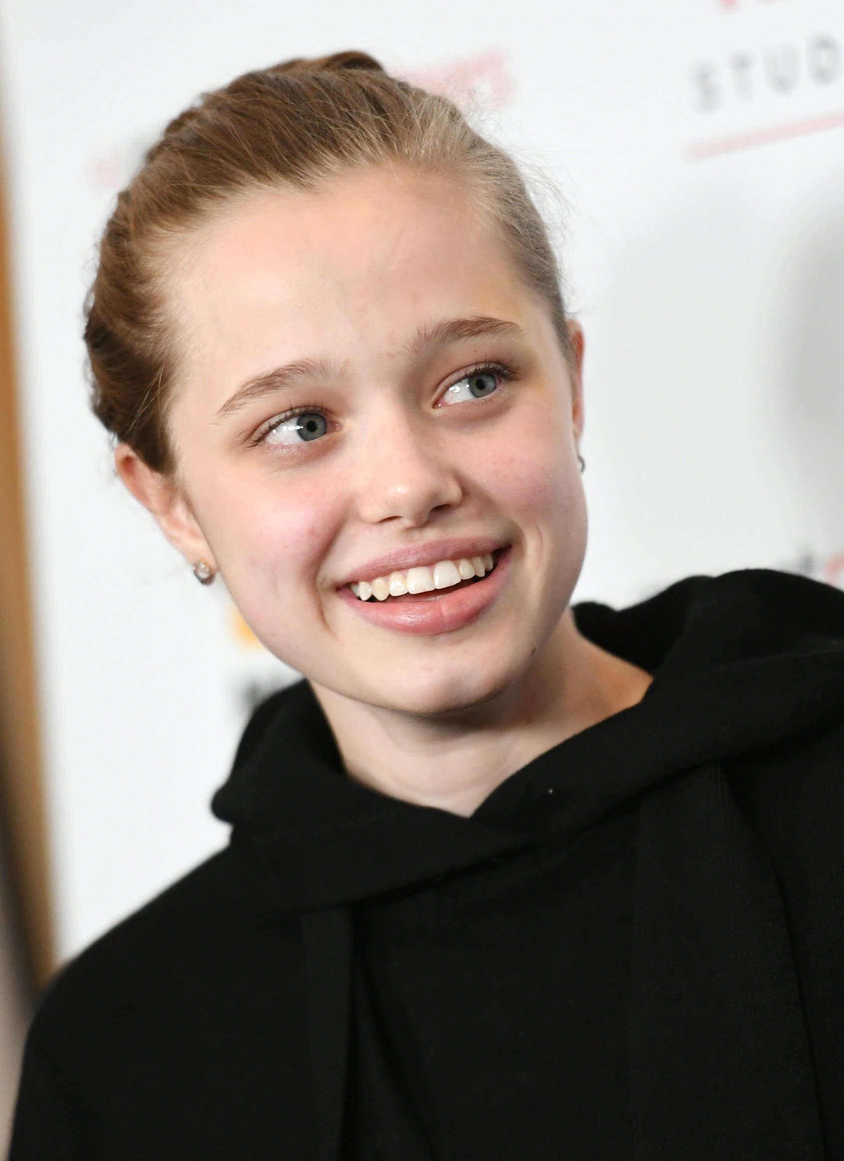 Click to open the image gallery Shiloh Jolie-Pitt at the Los Angeles premiere of MSNBC Films' "Paper & Glue: A JR Project" in November 2021