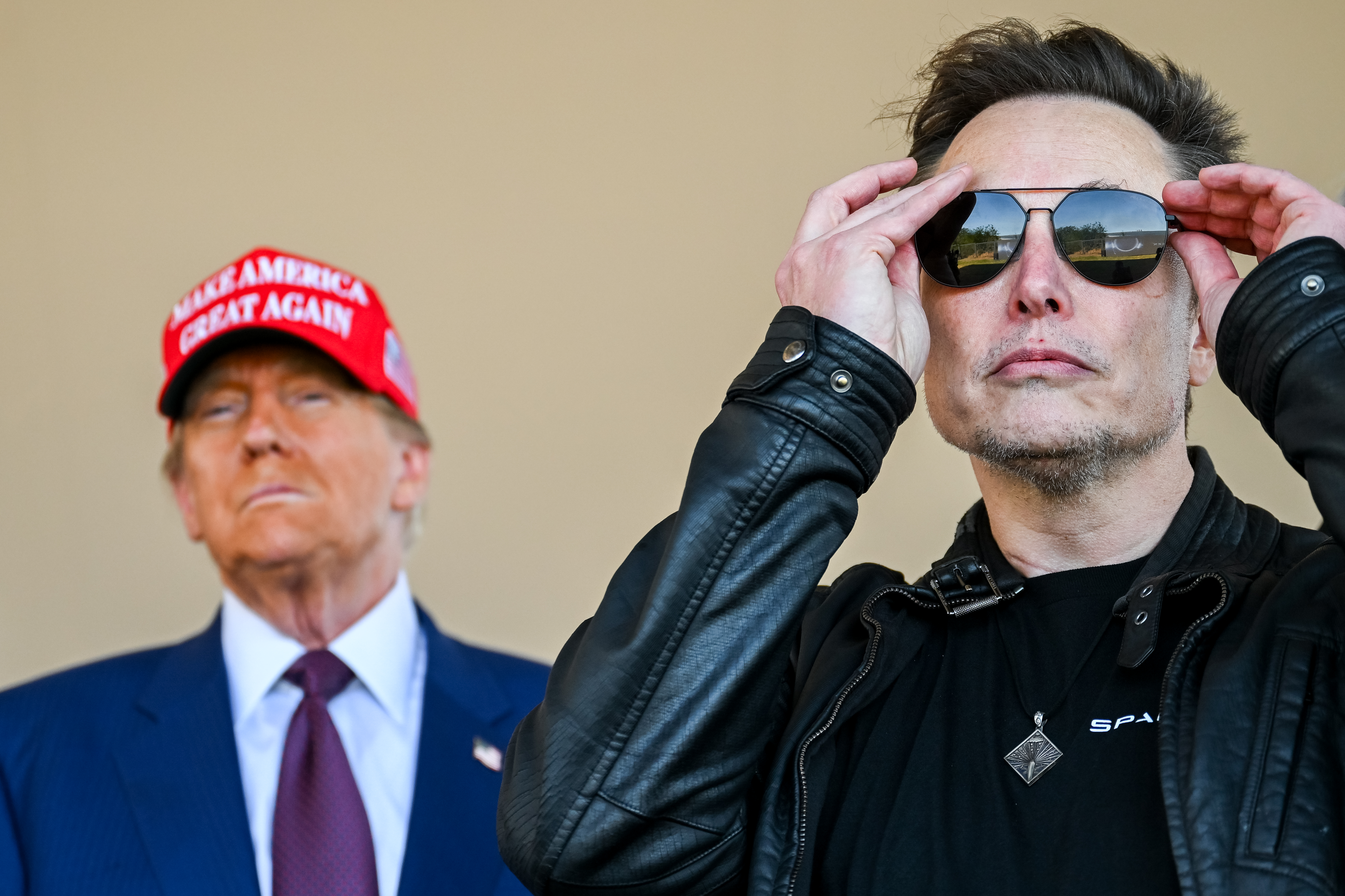 Elon Musk and Donald Trump watching a SpaceX Starship rocket launch in Brownsville, Texas