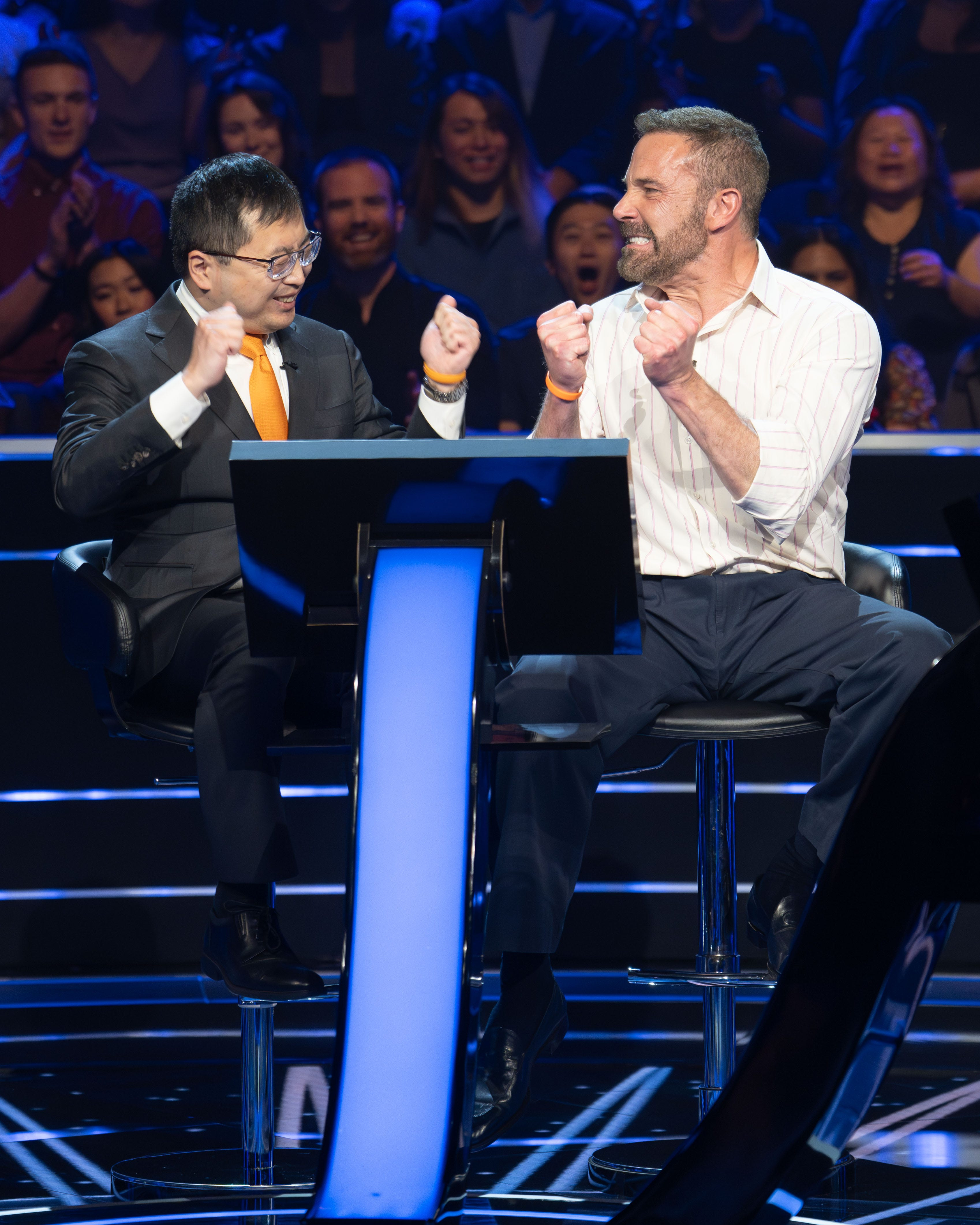 Ben Affleck and Jamie Ding on the set of Who Wants to Be a Millionaire