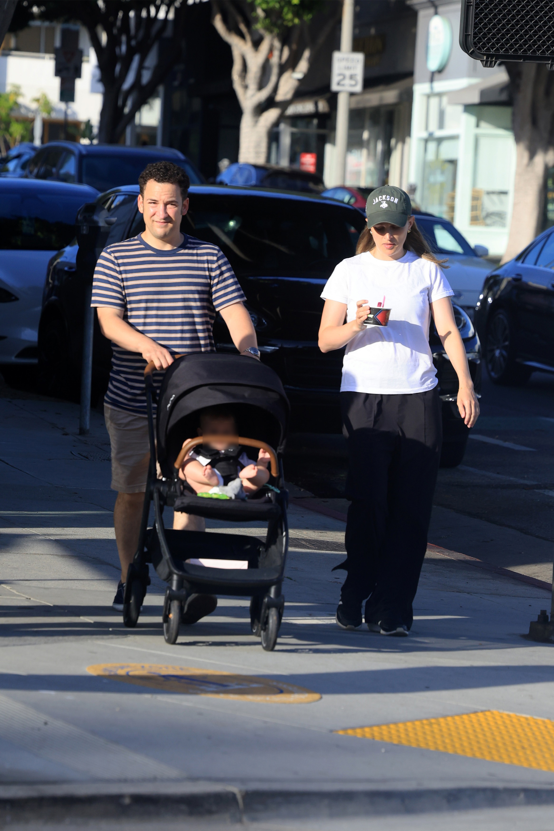Ben Savage carrying his baby daughter while out in Los Angeles