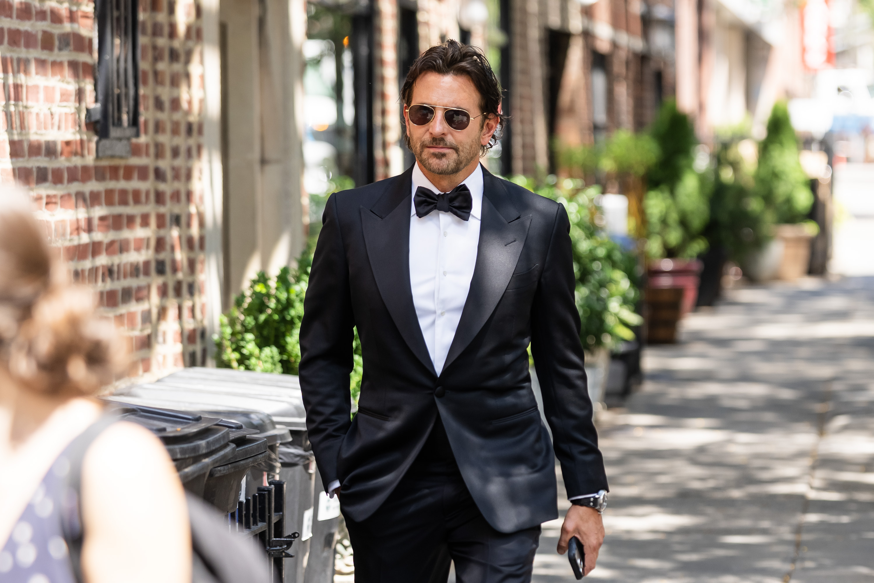 Click to open the image gallery Bradley Cooper walking in the West Village neighborhood of New York City