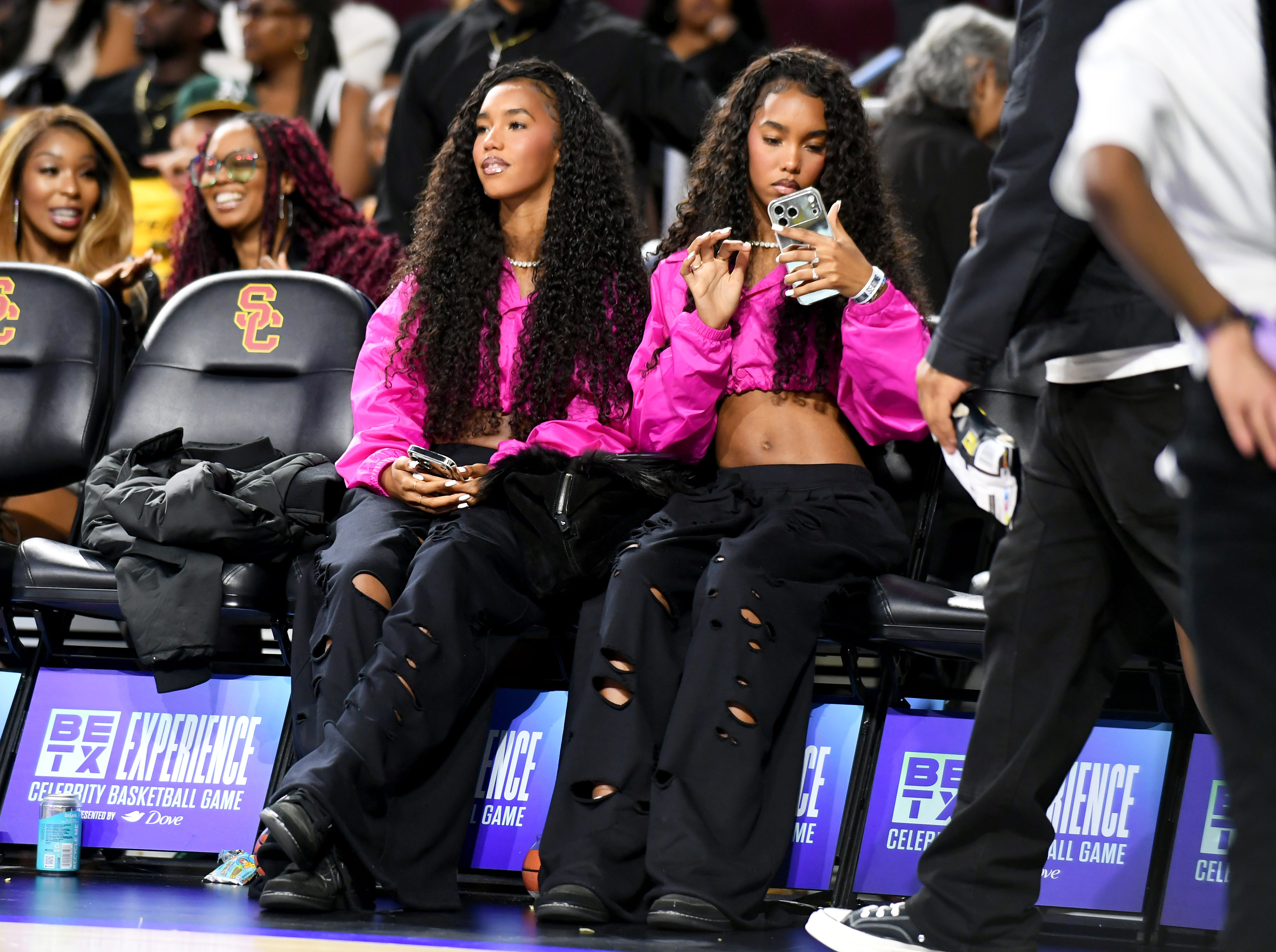 Jessie Combs and D'Lila Combs side by side at the BET Experience Celebrity Basketball Game at USC Galen Center in Los Angeles