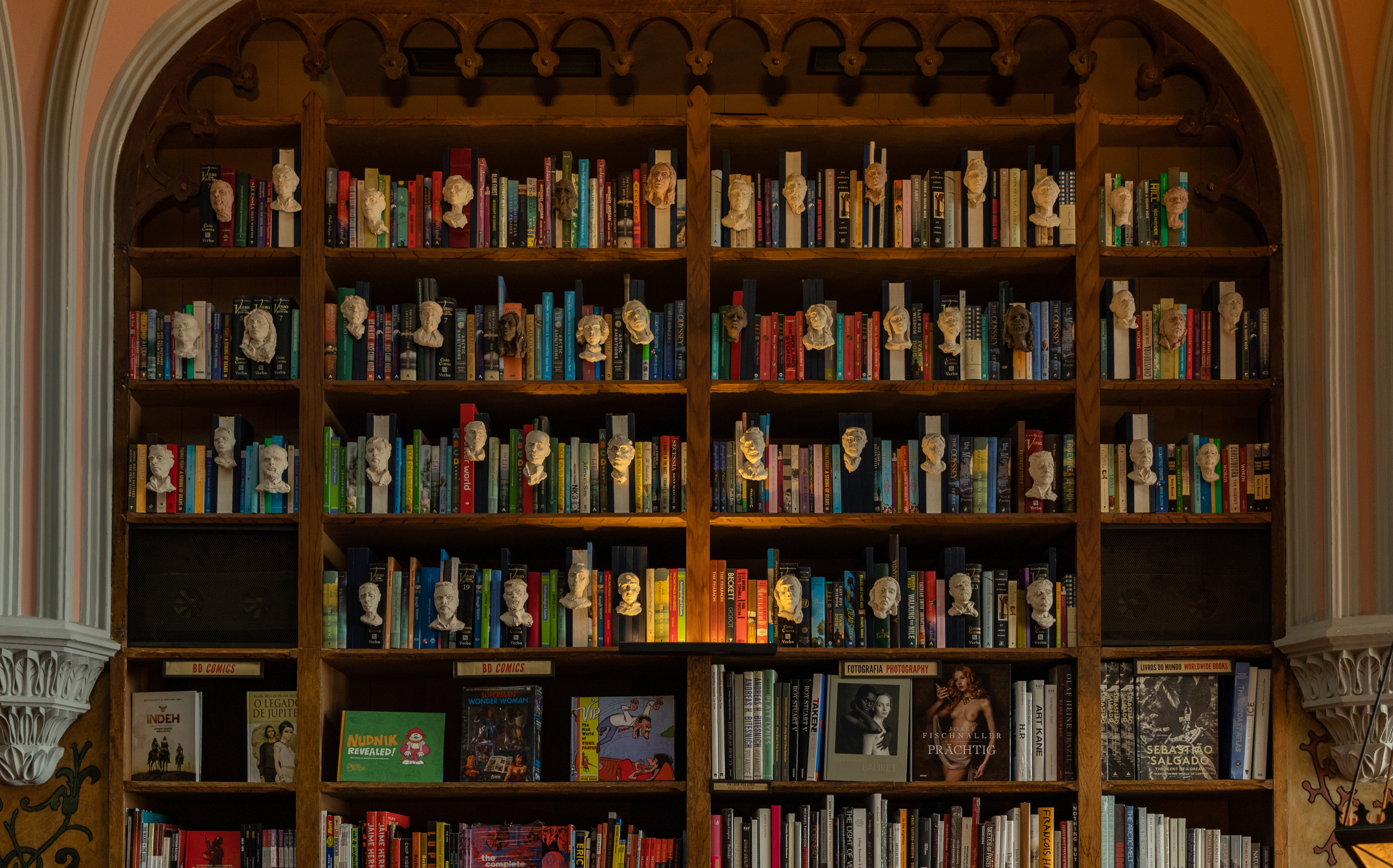 A picture of a bookshelf inside a bookstore.