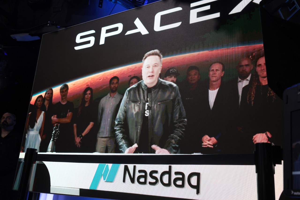 Elon Musk speaking via video screen at the Nasdaq Marketsite in Times Square during SpaceX's IPO launch