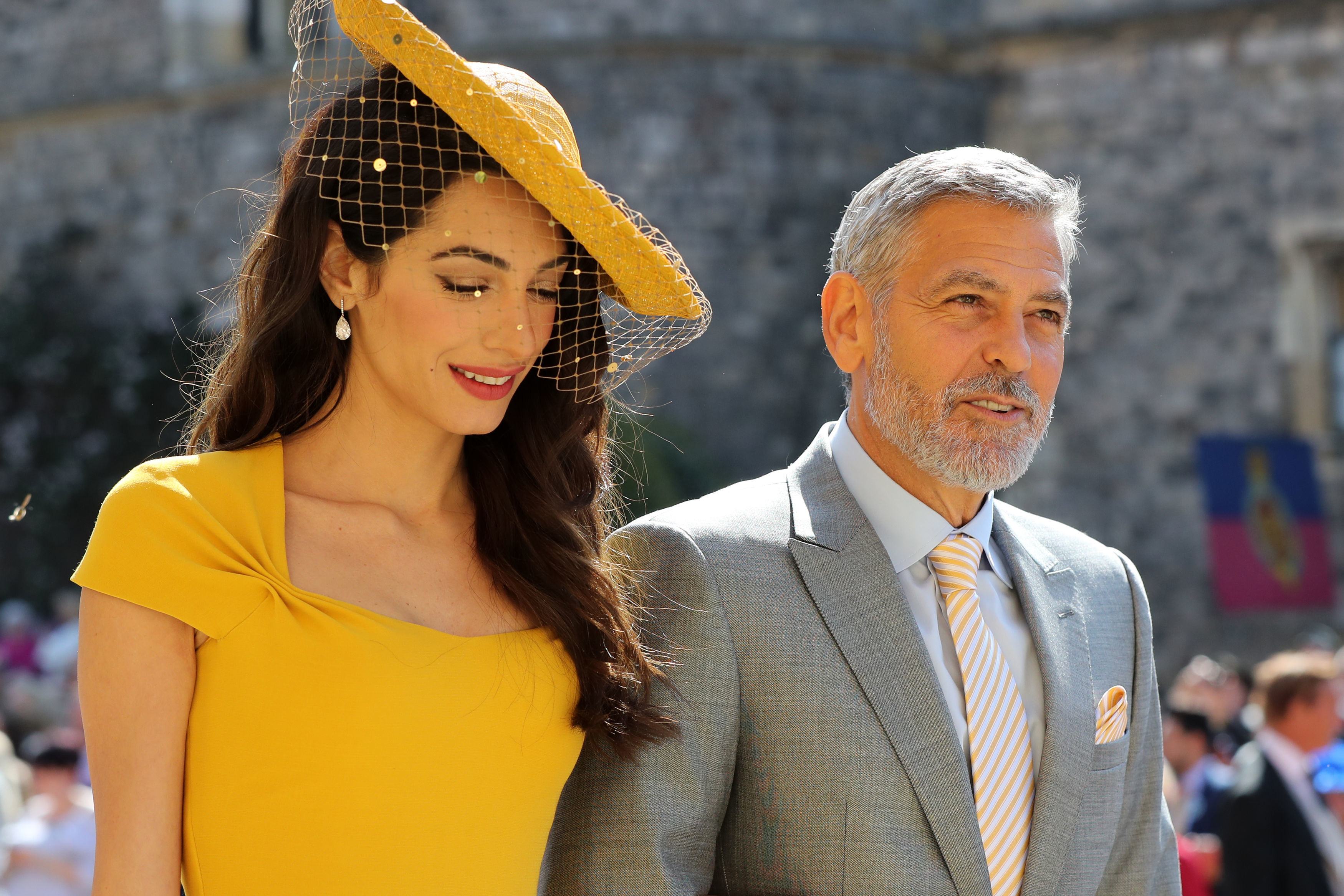 George Clooney and Amal Clooney arriving at St George's Chapel at Windsor Castle in May 2018