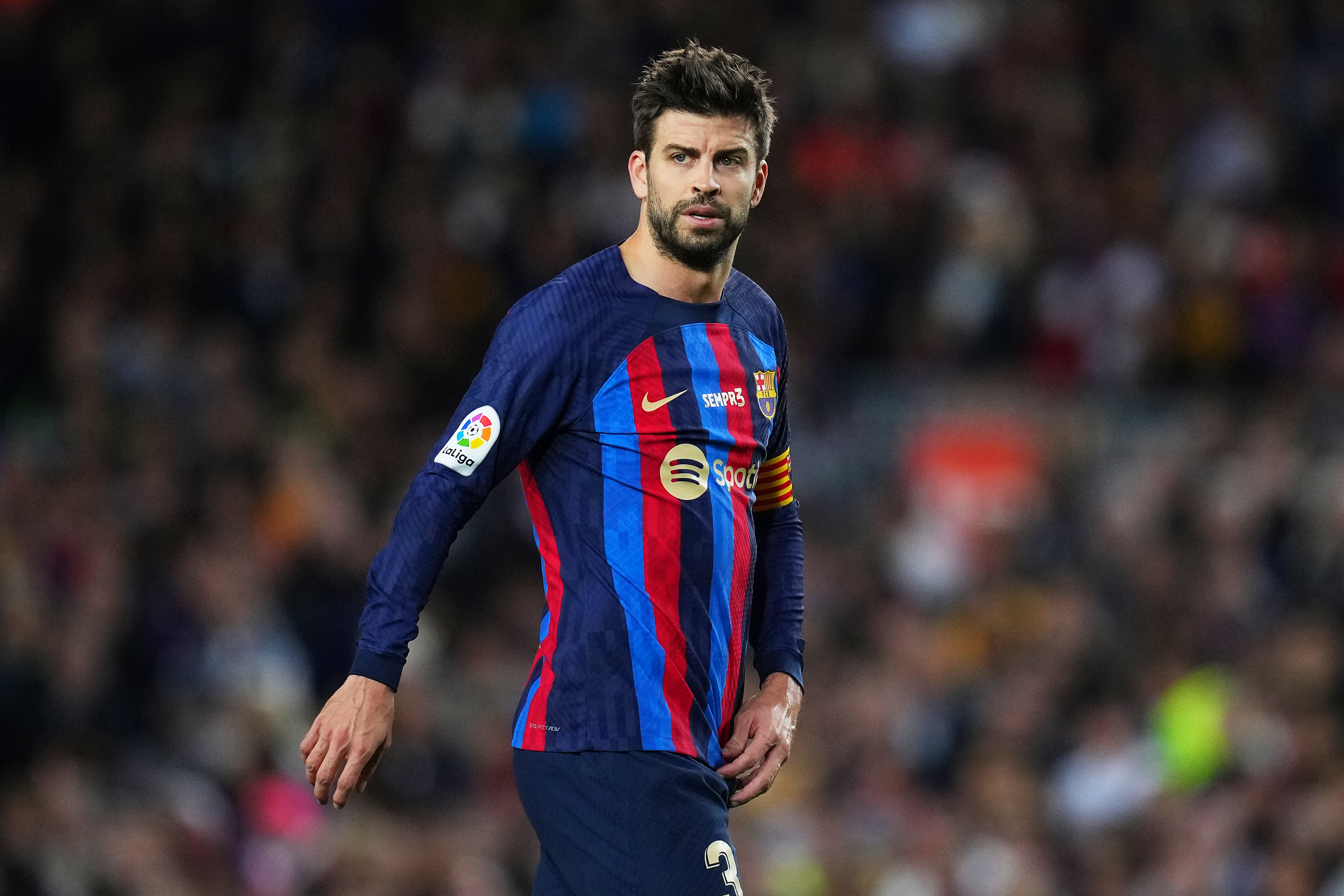 Gerard Pique in a Barcelona kit looking on during a LaLiga match at Spotify Camp Nou