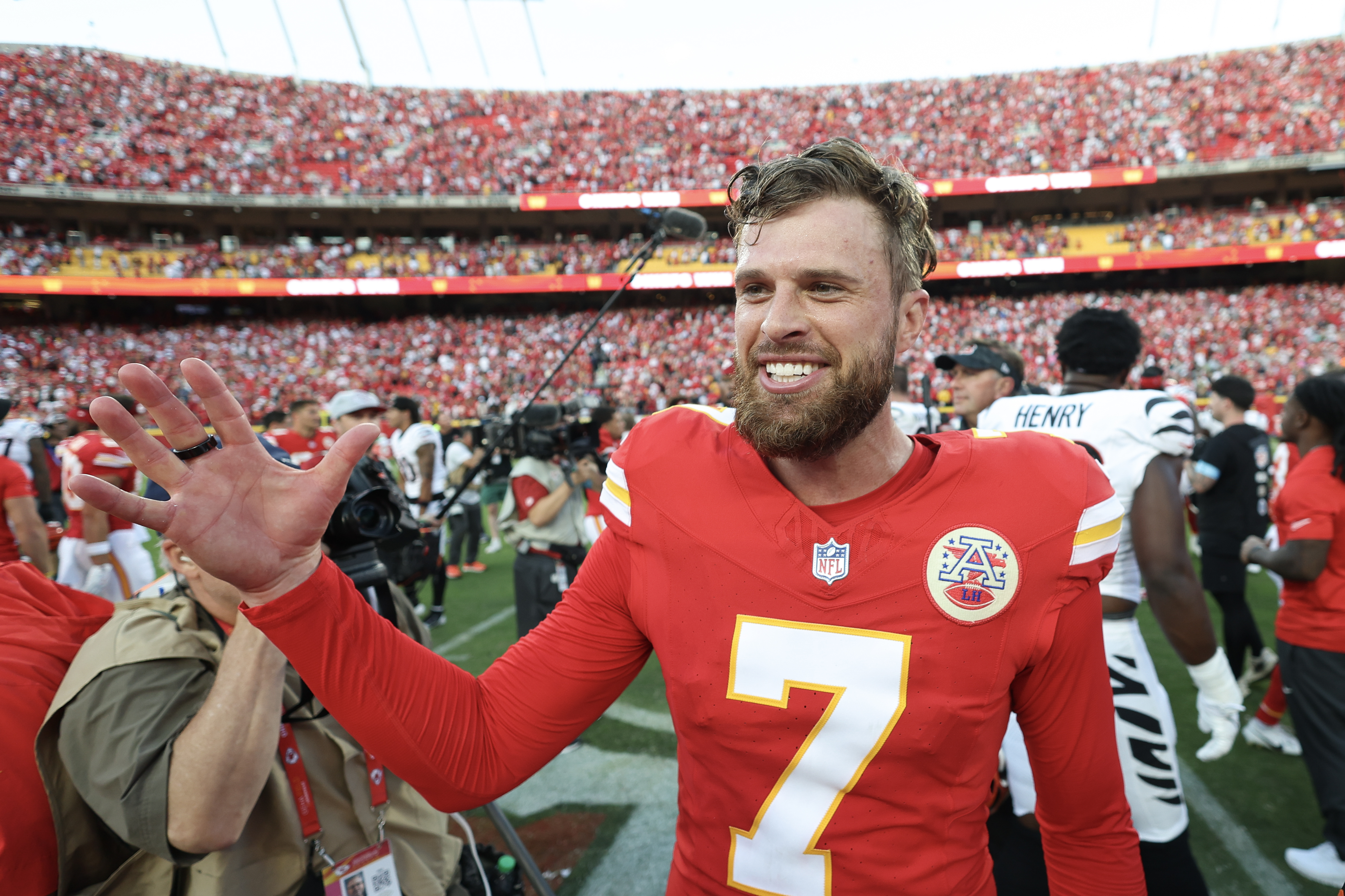 Harrison Butker #7 of the Kansas City Chiefs celebrating on the field at GEHA Field at Arrowhead Stadium