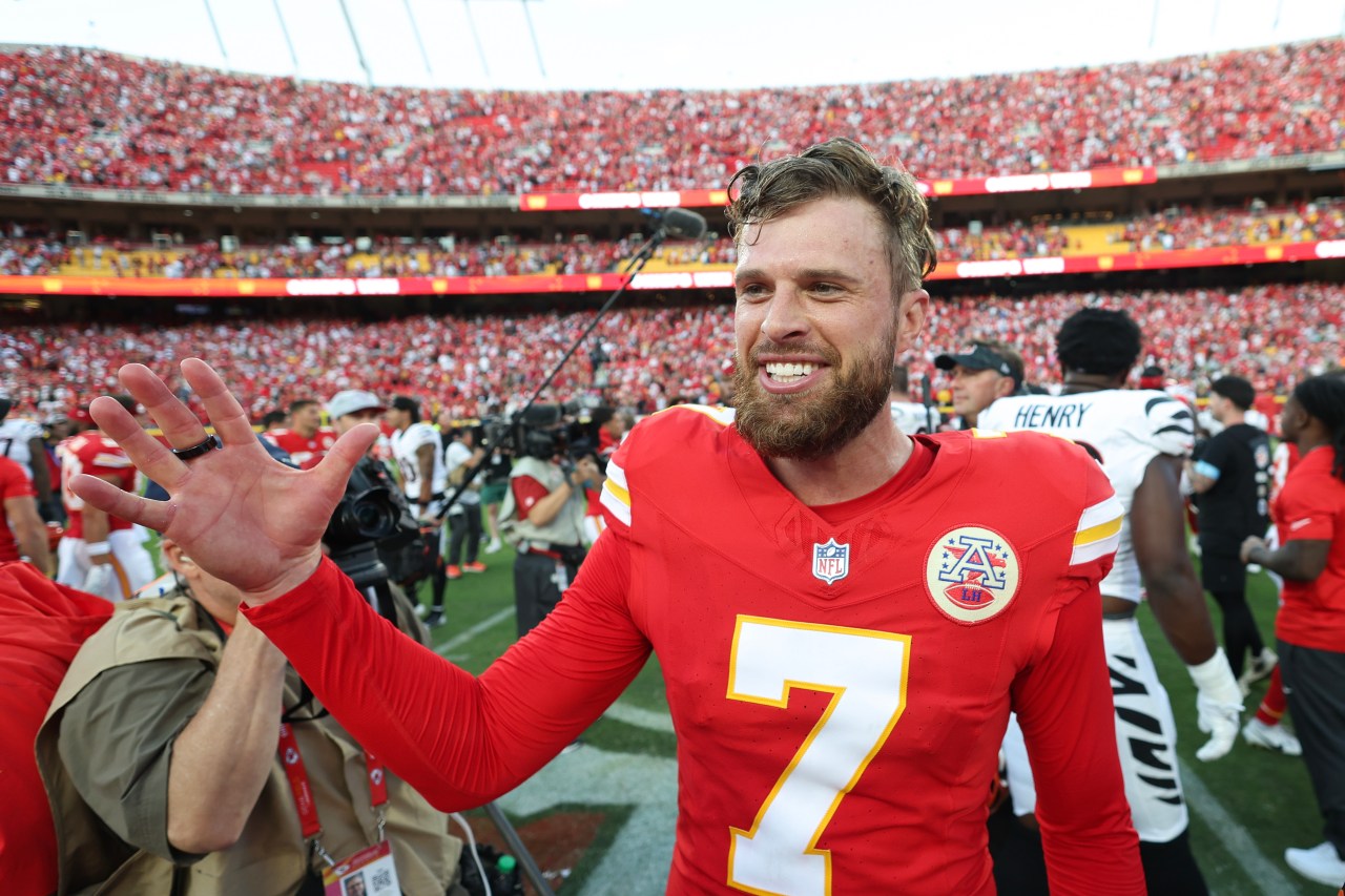 Harrison Butker #7 of the Kansas City Chiefs celebrating on the field at GEHA Field at Arrowhead Stadium